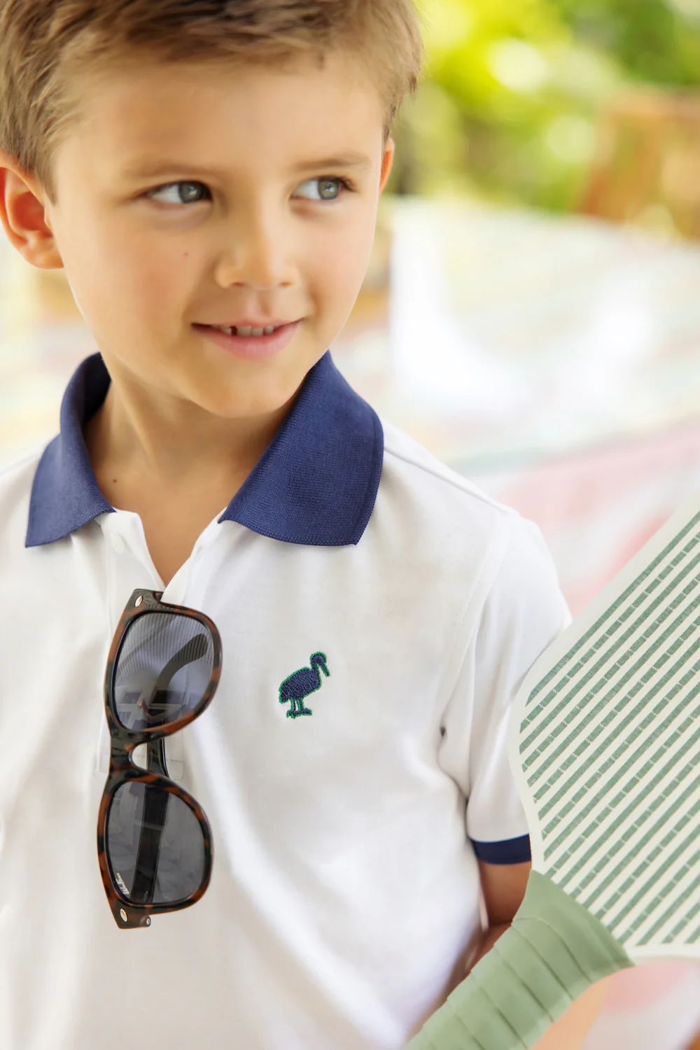 Prim & Proper Polo & Onesie - Worth Avenue White and Nantucket Navy with Nantucket Navy Stork | The Beaufort Bonnet Company