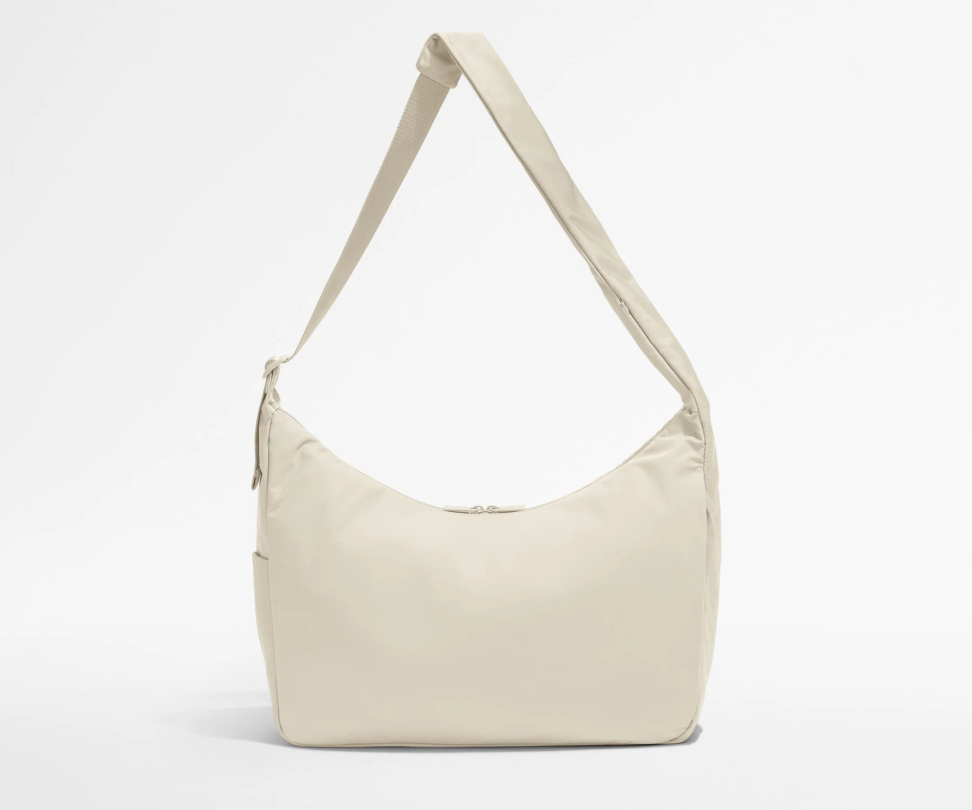 Browse the Amaro Brown Lightweight Crossbody Bag | Away | Away