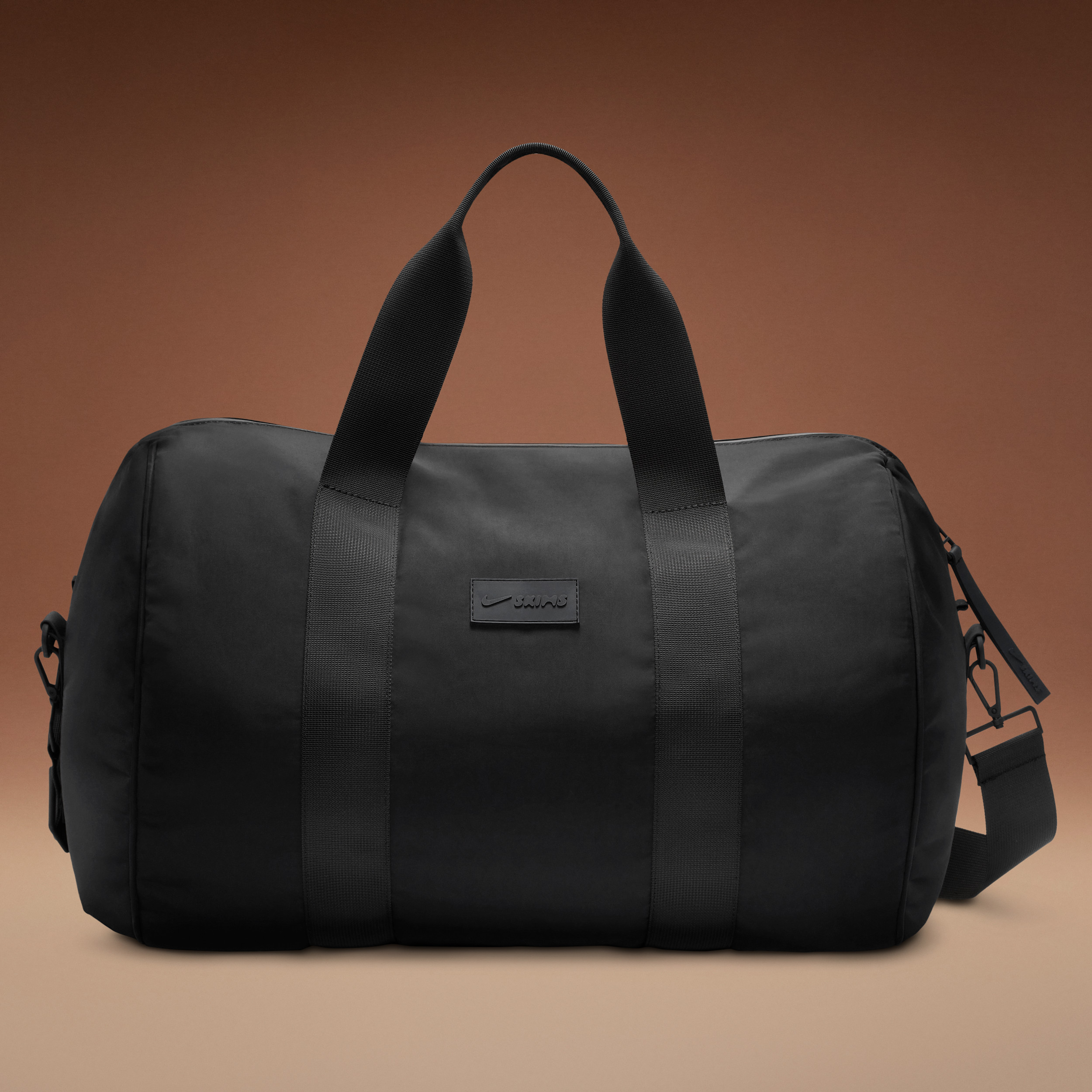 Nike Unisex SKIMS Puffer Gym Bag in Black | BPBGS2893-OBD | Nike (US)