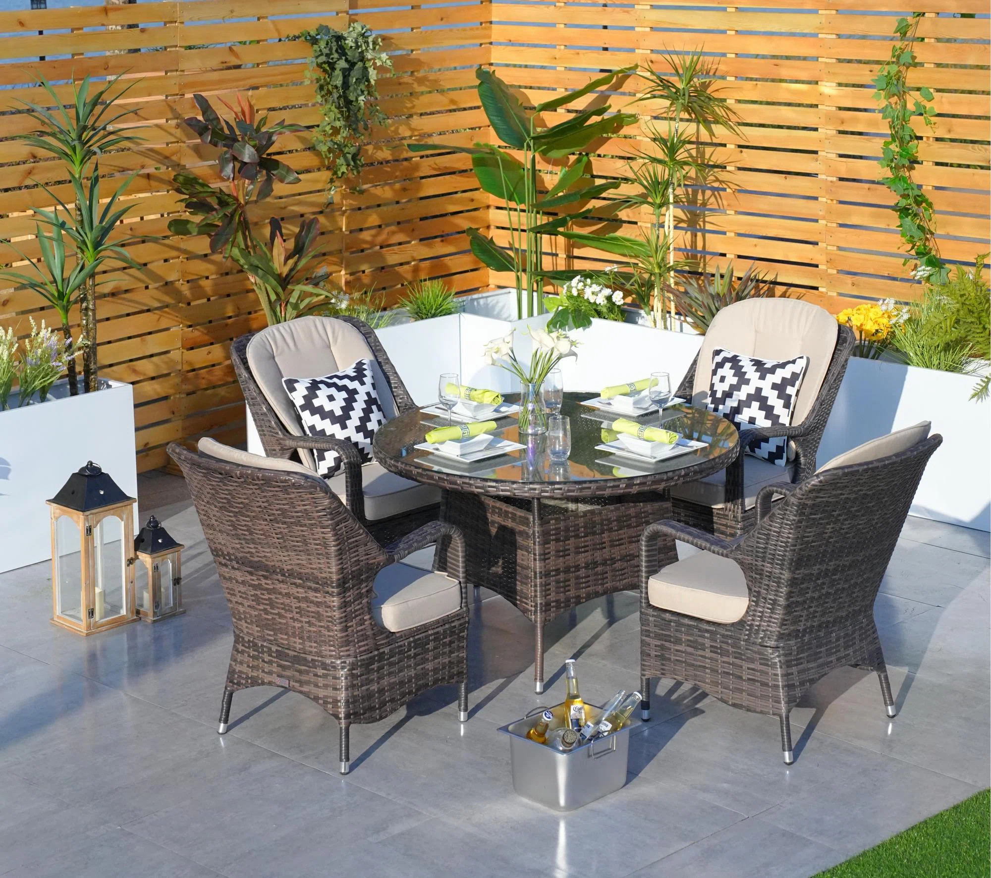Anikha 4 - Person Wicker Patio Dining Set with Round Table , Cushions Included | Wayfair North America