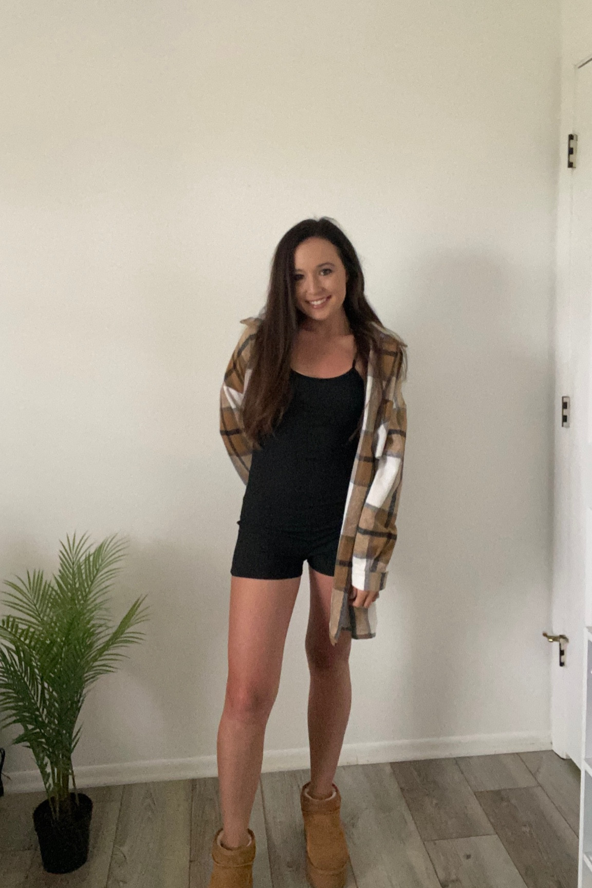 Onesie romper, flannel, and platform Uggs 

#LTKFestival #LTKFind #LTKSeasonal