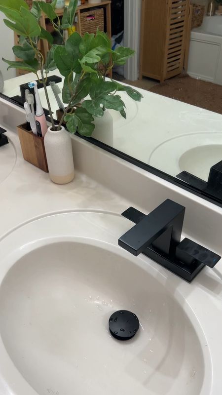 Loving the matte black accents with the wood tones in my bathrooms. Crazy how such a simple upgrade can really elevate your space. 

Bathroom decor, Bathroom faucet, Amazon finds, Amazon home, black fixtures, modern, transitional, organic modern 

#LTKVideo #LTKhome #LTKfindsunder100