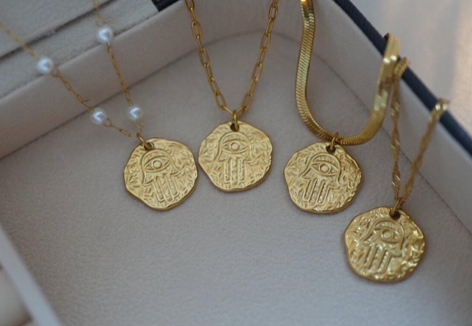 Obsessed with these Hamsa necklaces #hamsa #hamsahand #hamsanecklace 

#LTKFashionMonth #LTKbeauty