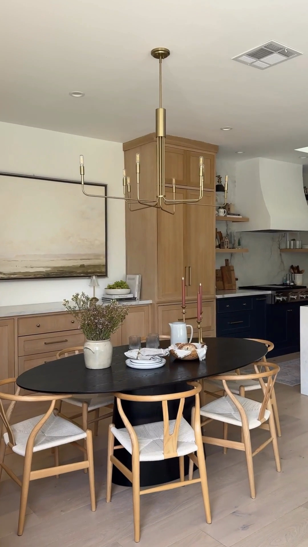 Changing out the chandelier was one of those small upgrades with major impact!
I can't believe this chandelier costs under $200! It's looks so designer but at an affordable price. I found It on Wayfair, along with pretty much everything else in our dining room. They always have the best designer looks at affordable prices. I'm so happy with how our dining room turned out! @wayfair #wayfair #wayfairpartner

#LTKSaleAlert #LTKHome