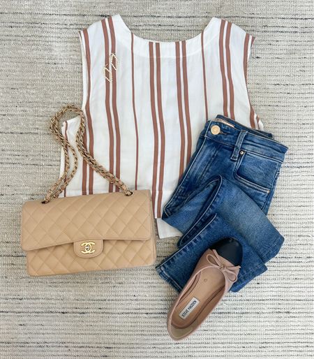 Summer outfit with stripe top paired with skinny jeans and flats for a chic look. Love this top with shorts, jeans, skirts and more! A classic look for the summer, vacations or dinners. 

#LTKStyleTip #LTKSeasonal