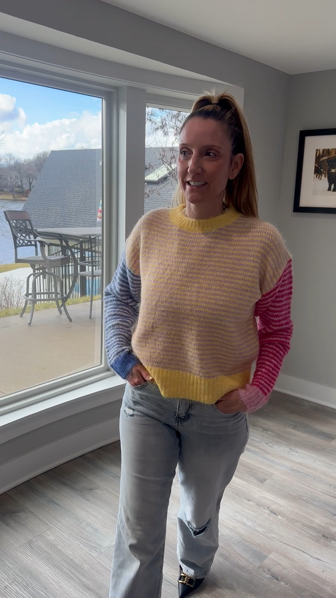 Adding a little whimsy to my Monday! ☁️💖 This sweater is the perfect mix of cozy and playful. It’s light enough for layering but bold enough to stand on its own for those morning Zoom calls. Tap the link in my bio to shop the exact knit on my LTK! 🧶🌟 #PlayfulFashion #CozyKnit #LTKunder100

Color-blocked sweater, striped knit, mismatched sleeves, yellow and tan stripes, pink and blue accents, light-wash jeans, distressed wide-leg denim, Weatherby Lake style, winter fashion 2026, playful casual wear, vibrant knits, WFH outfit inspiration, LTKfind, cheerful aesthetic

#LTKootd #LTKOver40 #LTKHome