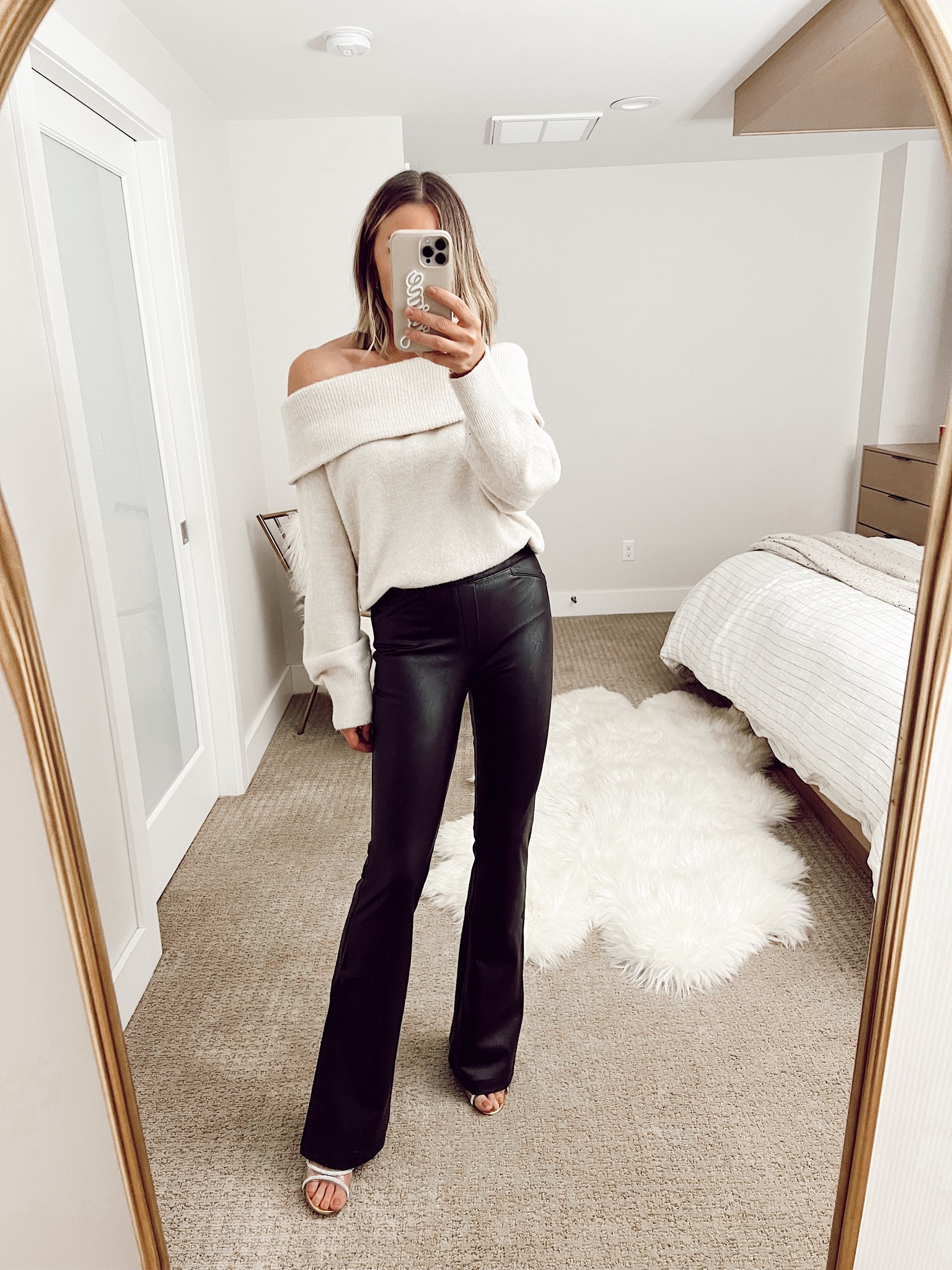 Off the shoulder sweater with flare faux leather pants
Use code JAIME10XSPANX 

#LTKHoliday #LTKstyletip