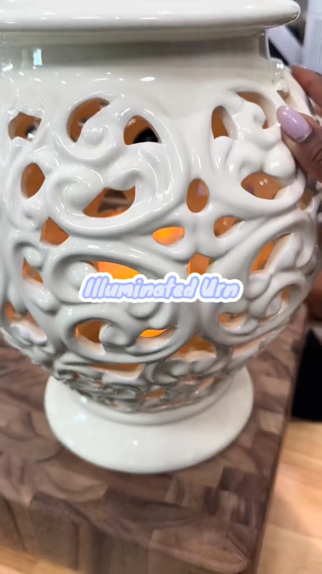 This ceramic lantern urn creates a warm glow with its realistic flickering flame effect. @QVC 