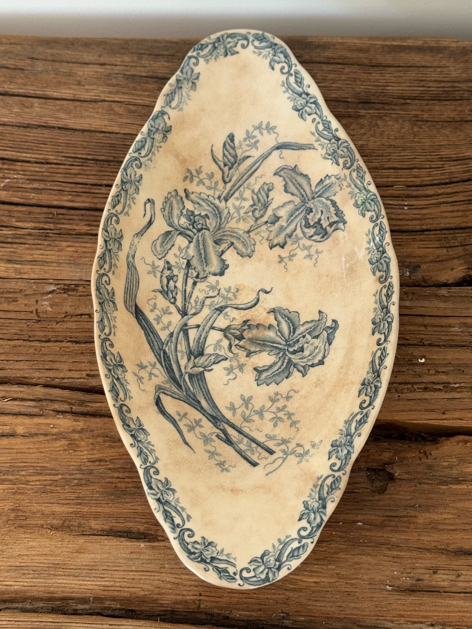 Antique French transferware ravier featuring delicate blue floral motifs, a softly aged ivory background, and beautiful timeworn patina. A timeless piece for shelf styling, kitchen displays, gallery walls, and collected European interiors.

#FrenchTransferware #FrenchIronstone #AntiqueFrenchDecor #CollectedInteriors #EuropeanFarmhouse #ShelfStyling #BlueAndWhiteDecor #FrenchCountryStyle

#LTKHome