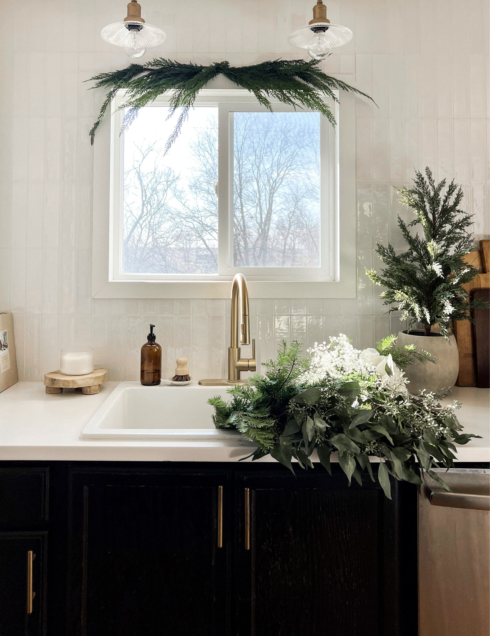 Christmas kitchen 🌲🌲

Organic modern. Neutral kitchen decor. Brass finishes. Brass faucet. Brass hardware. Tabletop tree. Christmas tree. Zellige tile. White tile wood tray. Charcuterie board. Wood board. Bread board  

#LTKHoliday #LTKhome #LTKfindsunder50