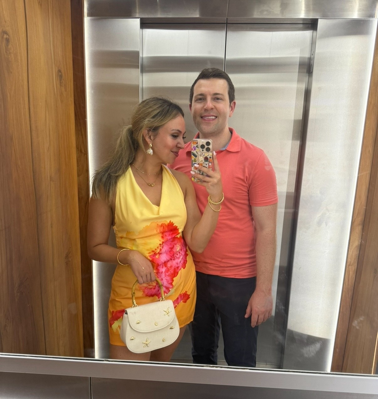 Vacation elevator selfie ft. my Amazon dress + Target purse 💛🌺
This halter mini was such a fun pop of color for a dinner night, and I’m obsessed with the little starfish details on the bag 🐚✨ Linking both because they’re so affordable + cute!
