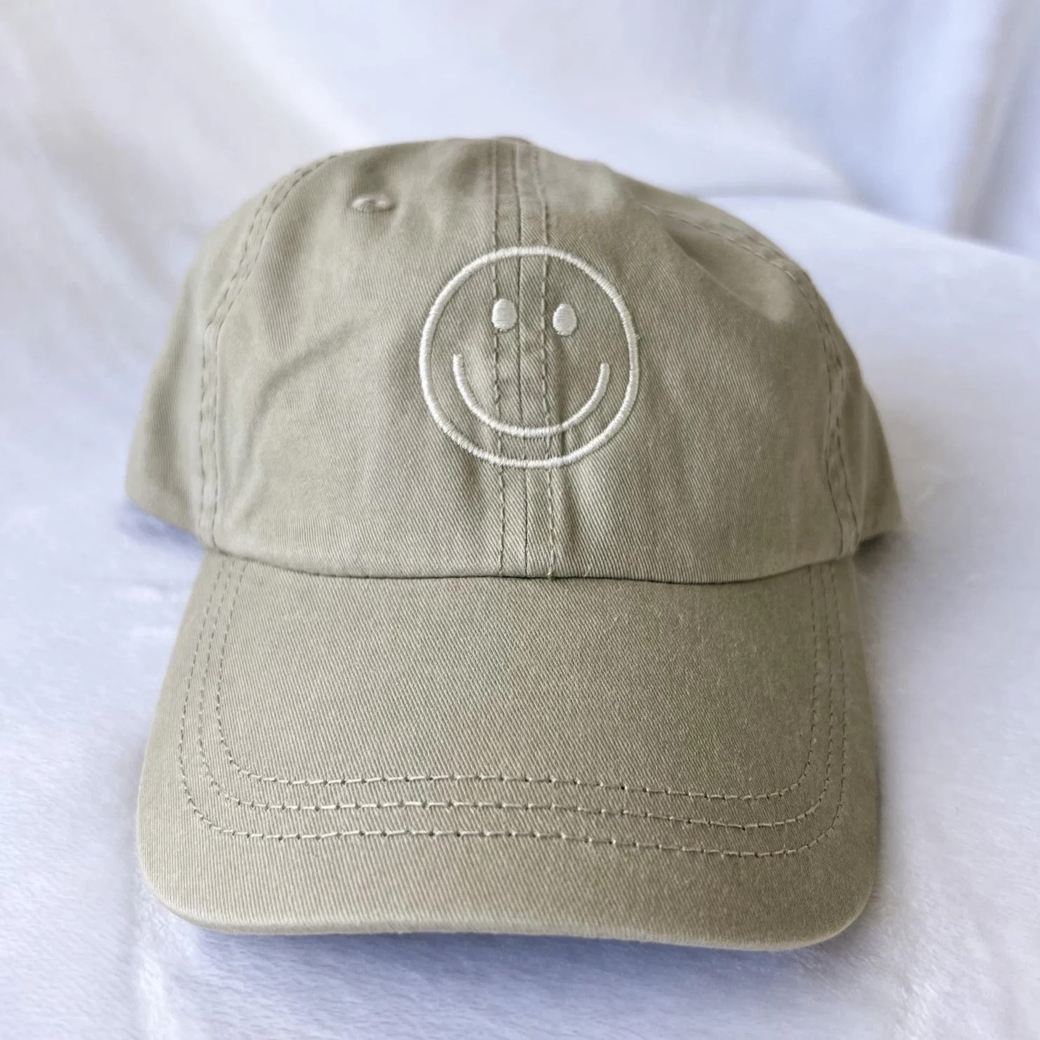 smiley face hat | light tan | Reef rain aria
