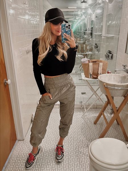 Travel outfit inspo // way home FP movement joggers (TTS), black crop (small), GG running style (size 38), mad.e hats, loopy phone case (code BAXTER10) 

#LTKunder100 #LTKunder50 #LTKstyletip