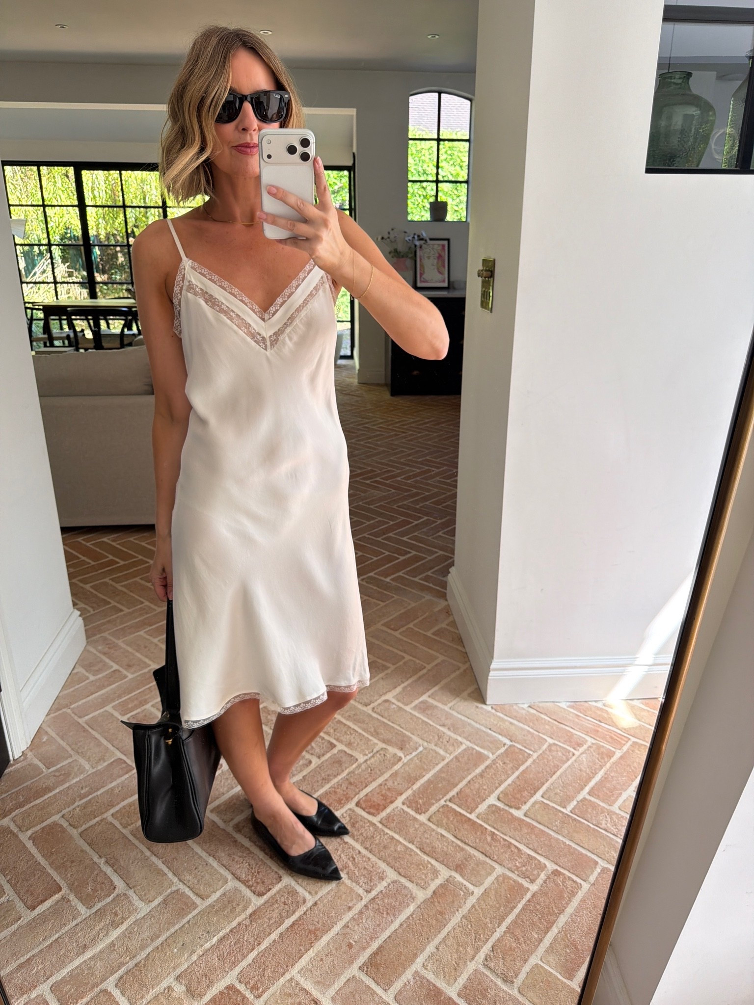 cream satin slip dress, ivory slip dress, lace trim slip dress, white satin dress, v neck slip dress, midi slip dress, lingerie inspired dress, strappy midi dress, black pointed flats, pointed

#LTKeurope #LTKshoes #LTKsummer
