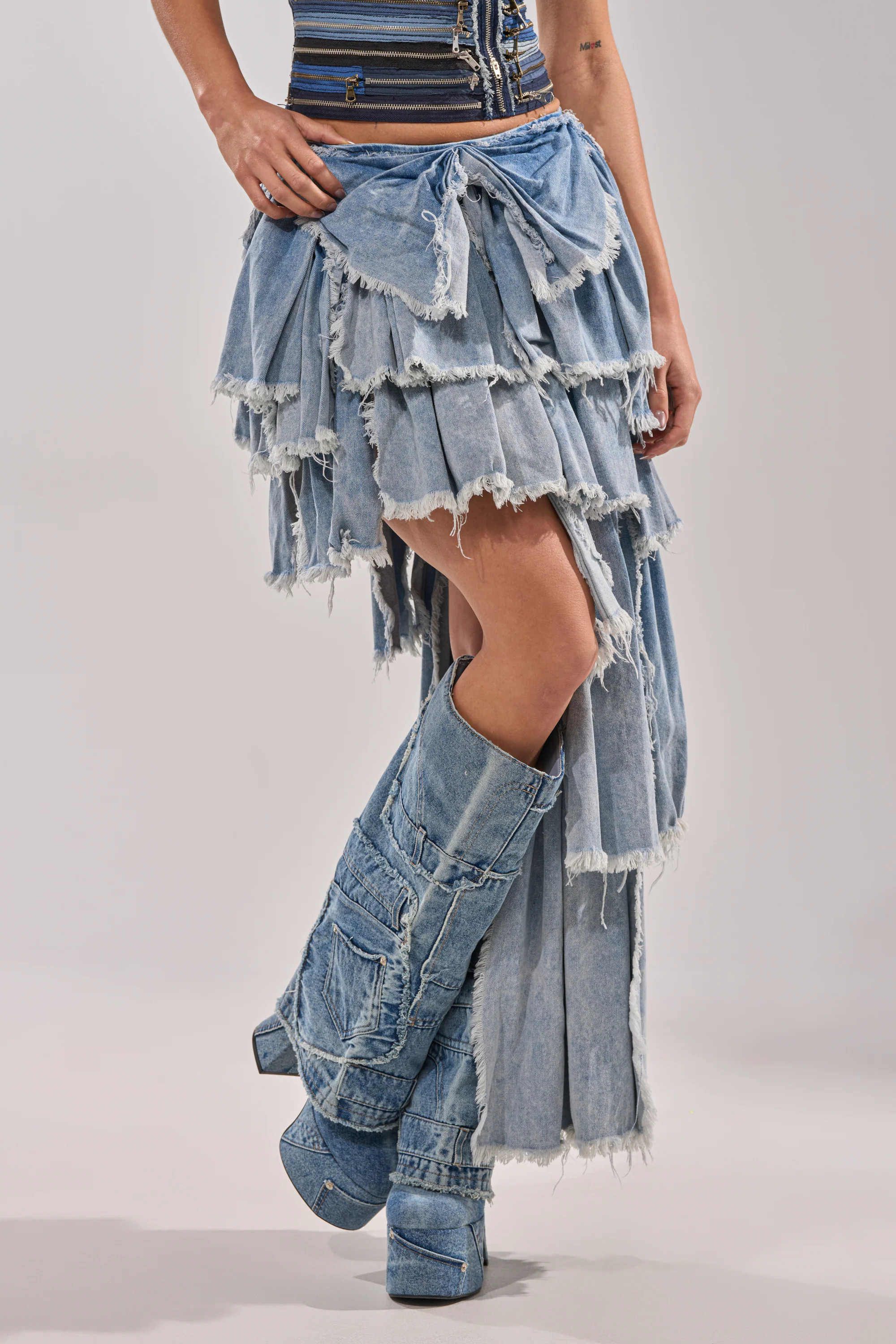 DISTRESSED TIERED ASYMMETRIC MIDI SKIRT | AKIRA