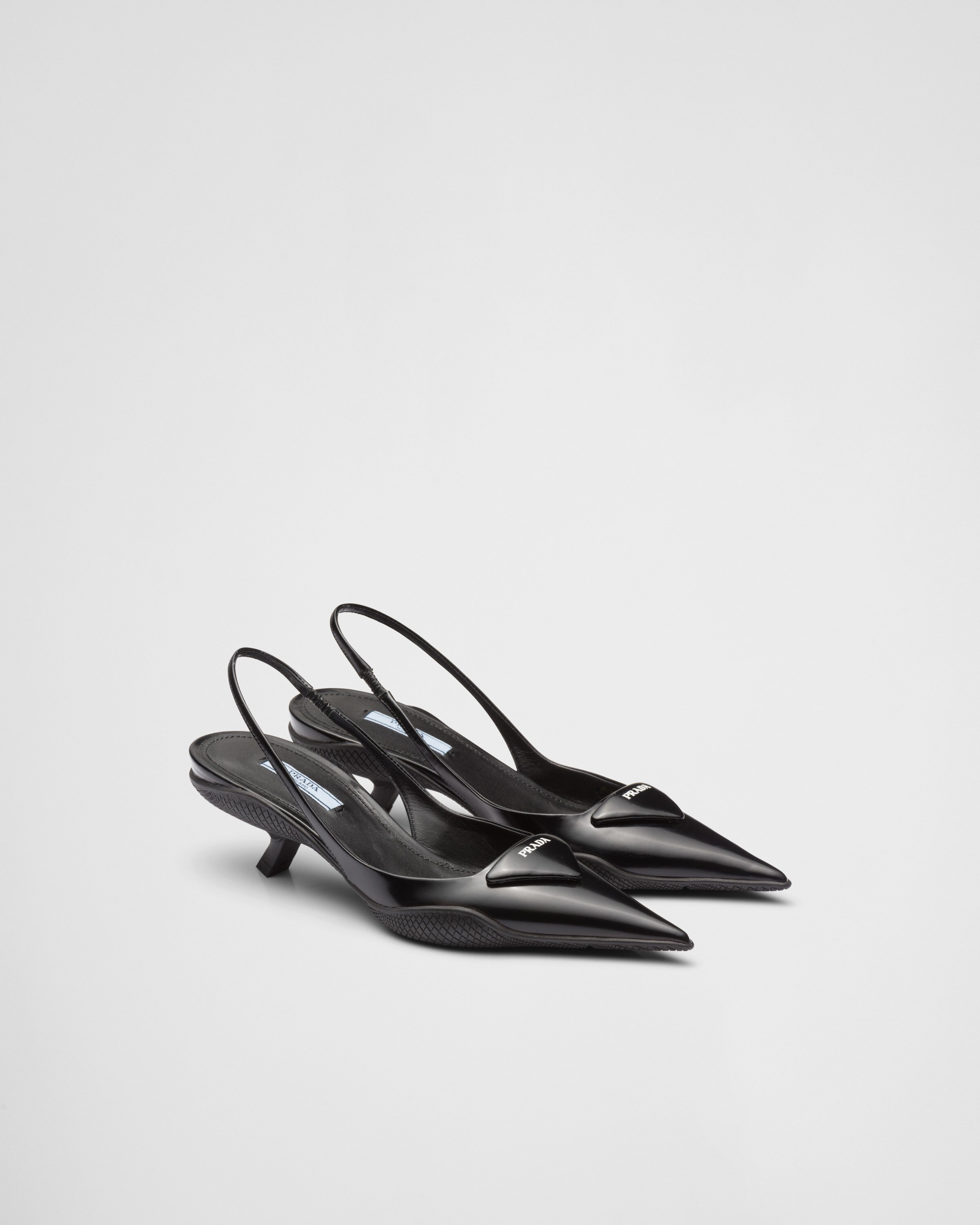 Brushed leather slingback pumps | Prada Spa US