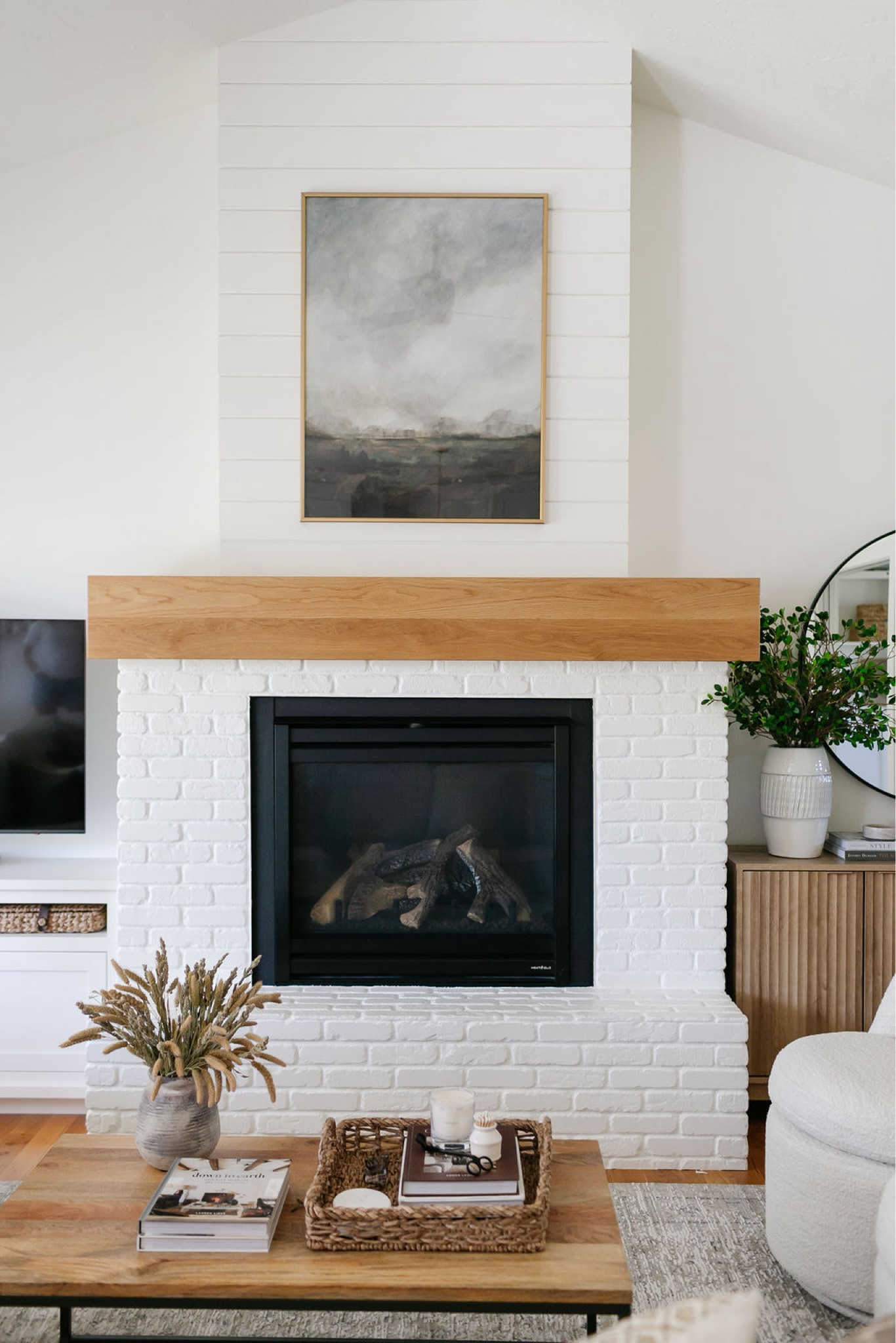 Artwork. Living room decor. Home decor. Coffee table decor. 
* My coffee table is the West Elm table linked but the top is mango wood which is discontinued. Mango wood is available in other table linked. Also linked a similar Amazon option. 

#LTKSaleAlert #LTKHome #LTKSeasonal