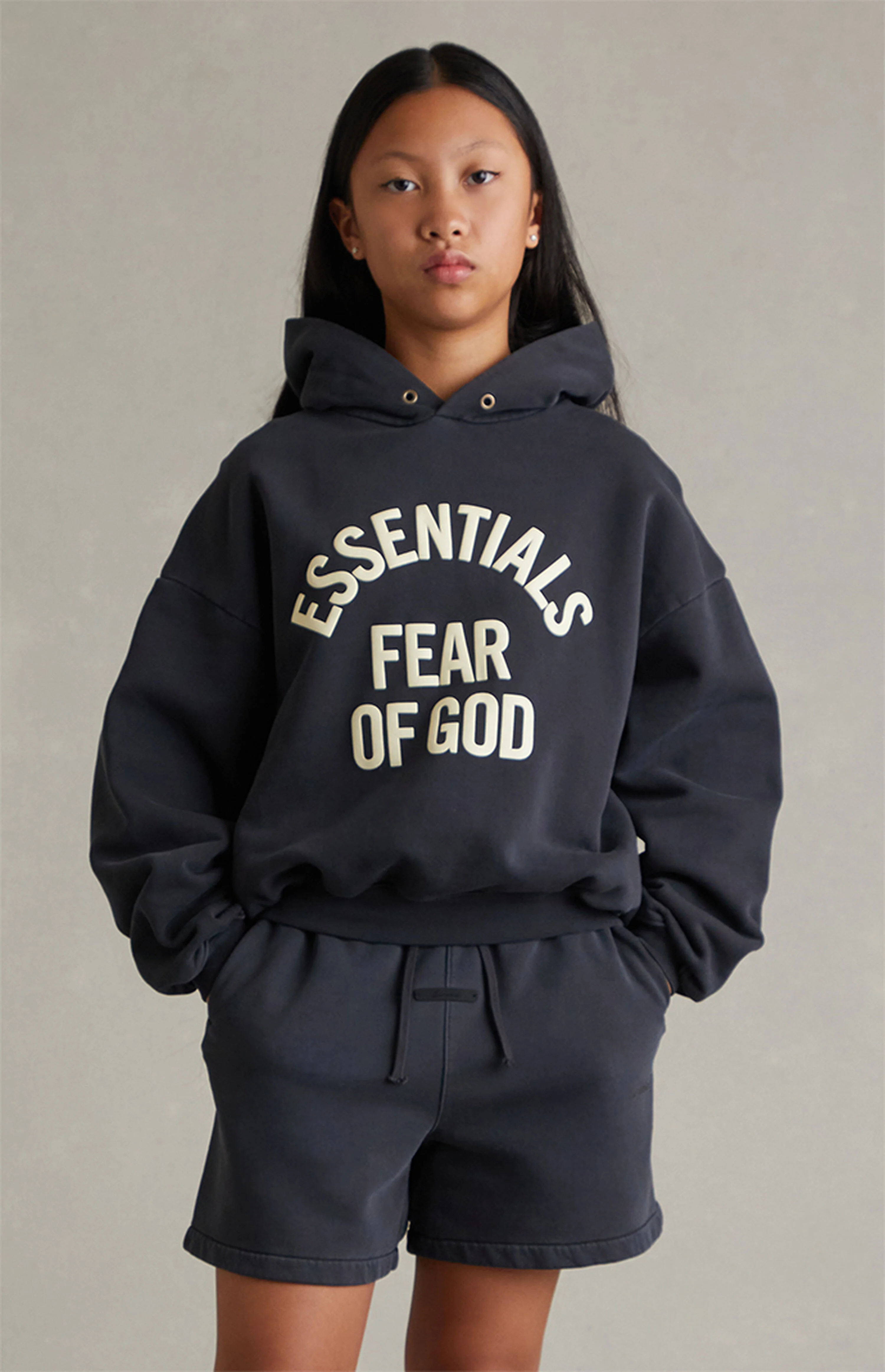 Fear of God ESSENTIALS Kids Faded Black Signature Classic Sweat Shorts | PacSun
