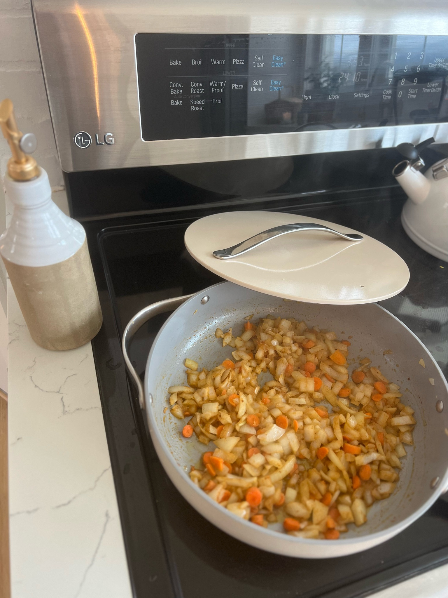 My solid nontoxic cookware and lovely olive oil holder . 

Pots: 

Olive oil holder: Farmhouse Pottery 