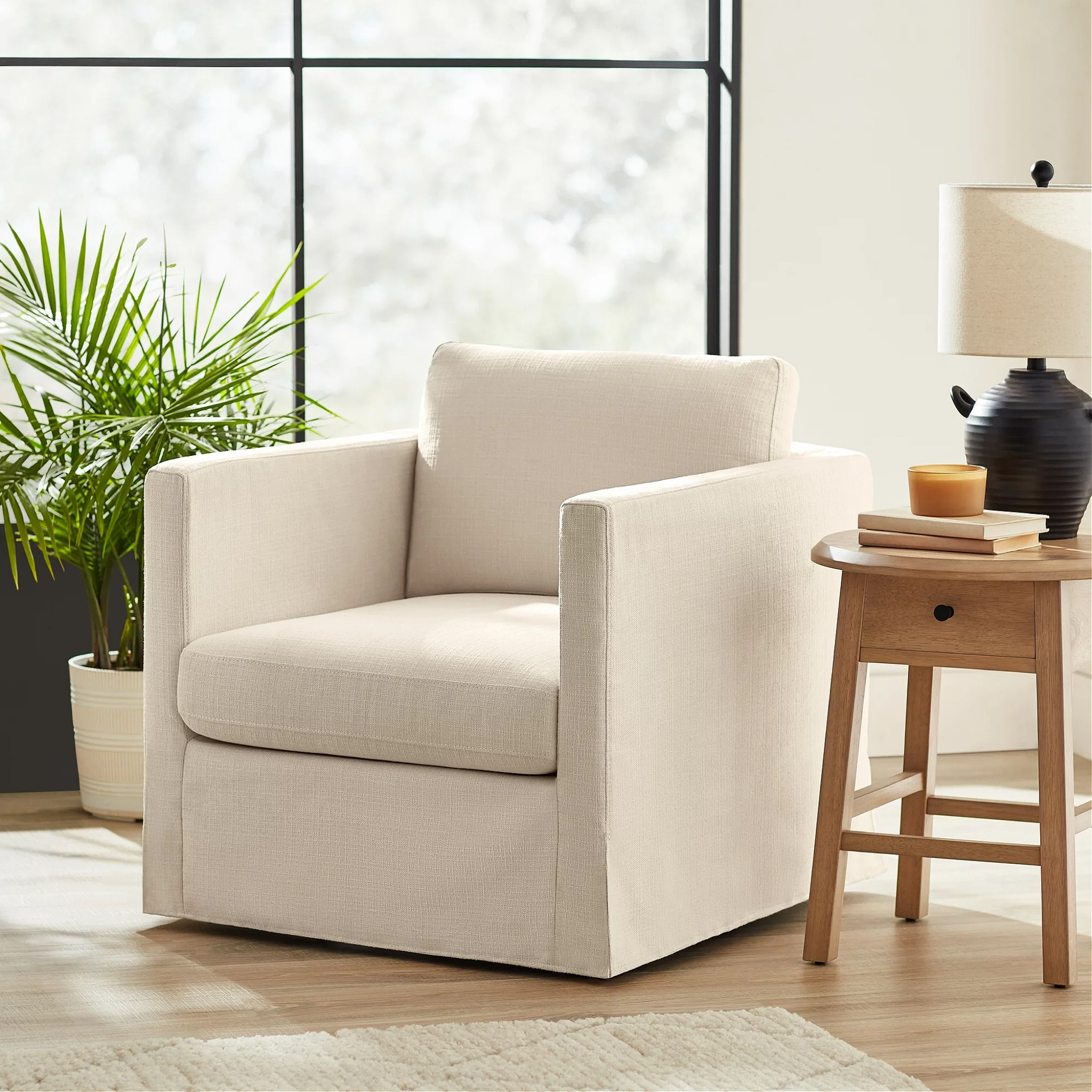 I found this stunning armchair for less than $250! Not only that but it's slipcovered and it swivels! Grab it while you can! 

#LTKhome #LTKMostLoved #LTKstyletip