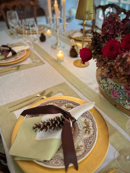 Creating an elegant holiday table starts with pretty lighting, linens, and place settings. 

#LTKhome #LTKHoliday #LTKSeasonal