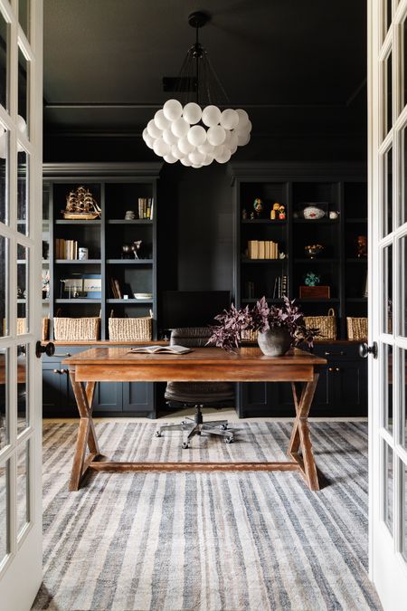 Our moody home office.  Paint color is Behr’s Dark Secret 🖤



#LTKhome