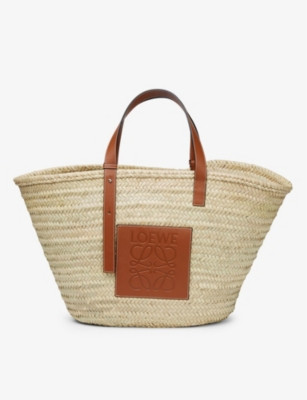 Logo-embossed large palm leaf and leather basket bag | Selfridges