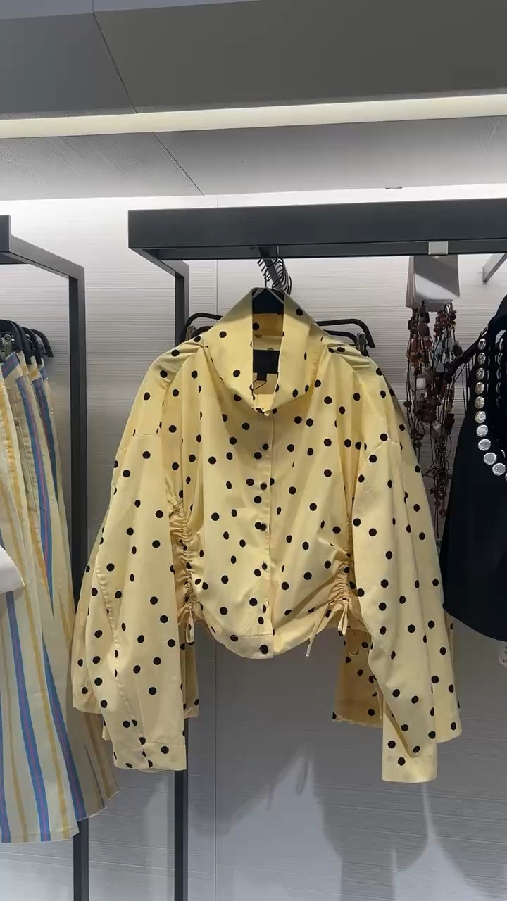 Yellow and black polka dot jacket with side ruching 

#LTKootd