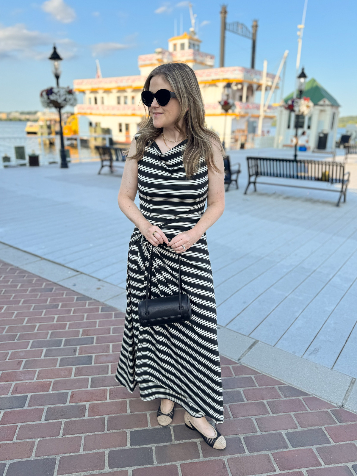 Wearing size M. Obsessed with this wrap jersey dress. Wore it for my husband's birthday dinner but also planning to wear into fall. There's a dress underneath the wrap piece, and you can style the wrap piece however you think looks the most flattering without worrying about whether it's too revealing. 

 #LTKdayinmylife #LTKmomlife