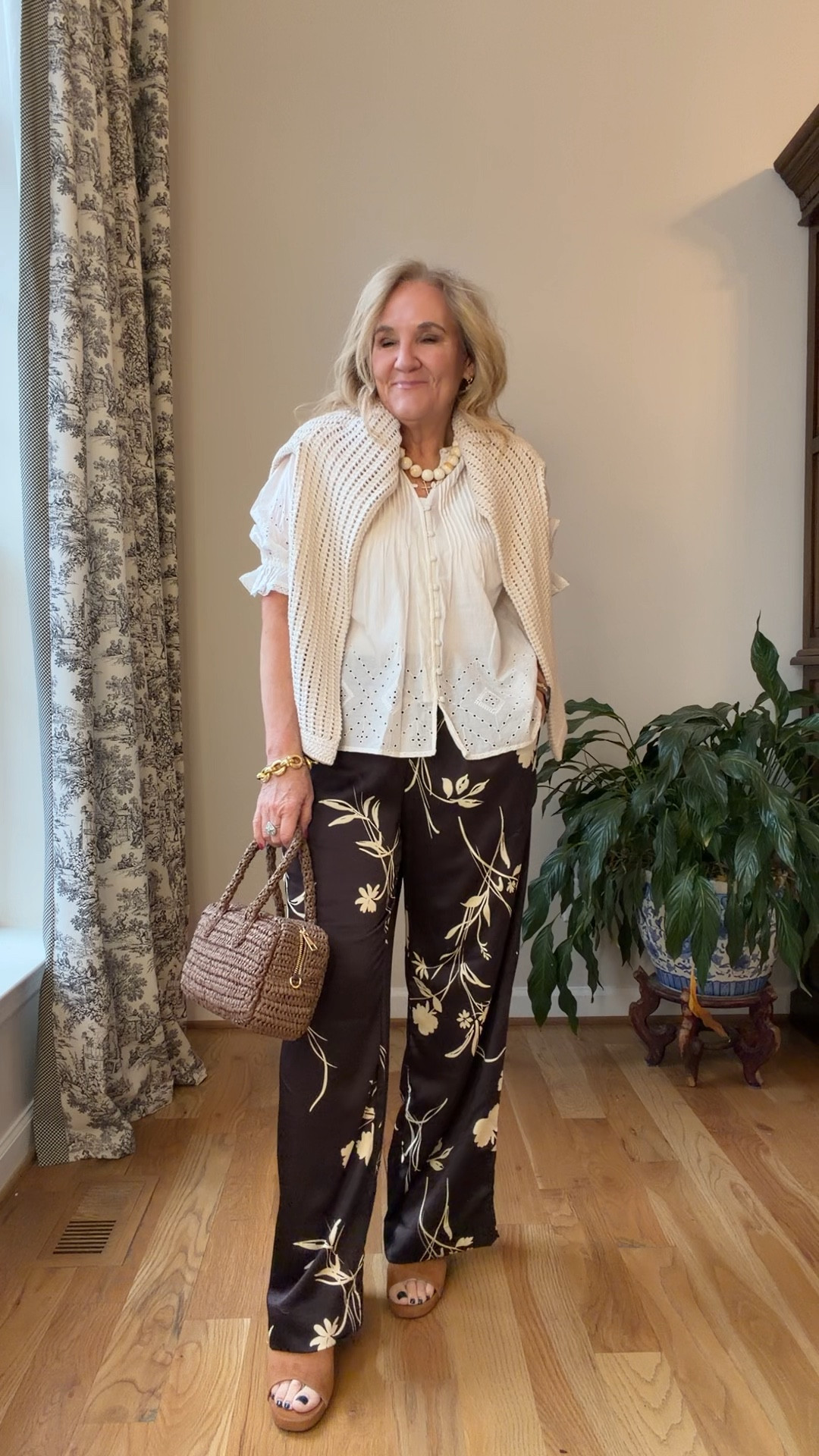 New target arrivals size medium. I am wearing a cami underneath I’ll link a similar. Blouse is a bit sheer. A nude bra would work too. 
Such a cute satchel bag for spring! 
Wedge sandals tts 
Vacation outfit spring outfit 

#LTKOver40 #LTKPetite #LTKTravel