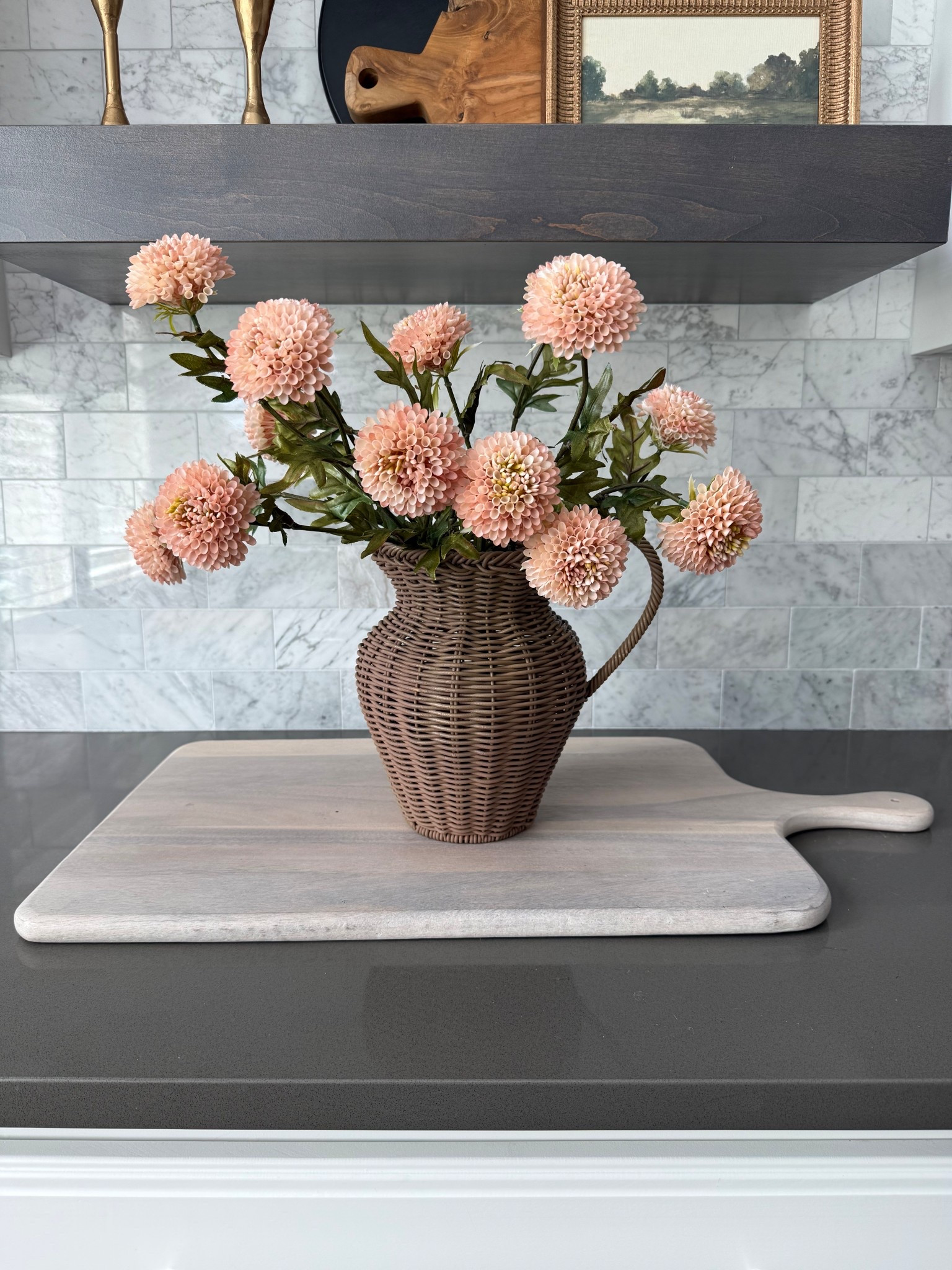 A quick color refresh to upgrade this $18 rattan pitcher! I also cannot get over how realistic these faux zinnias are! I have 2 bundles here! 

#LTKSeasonal #LTKHome #LTKGiftGuide