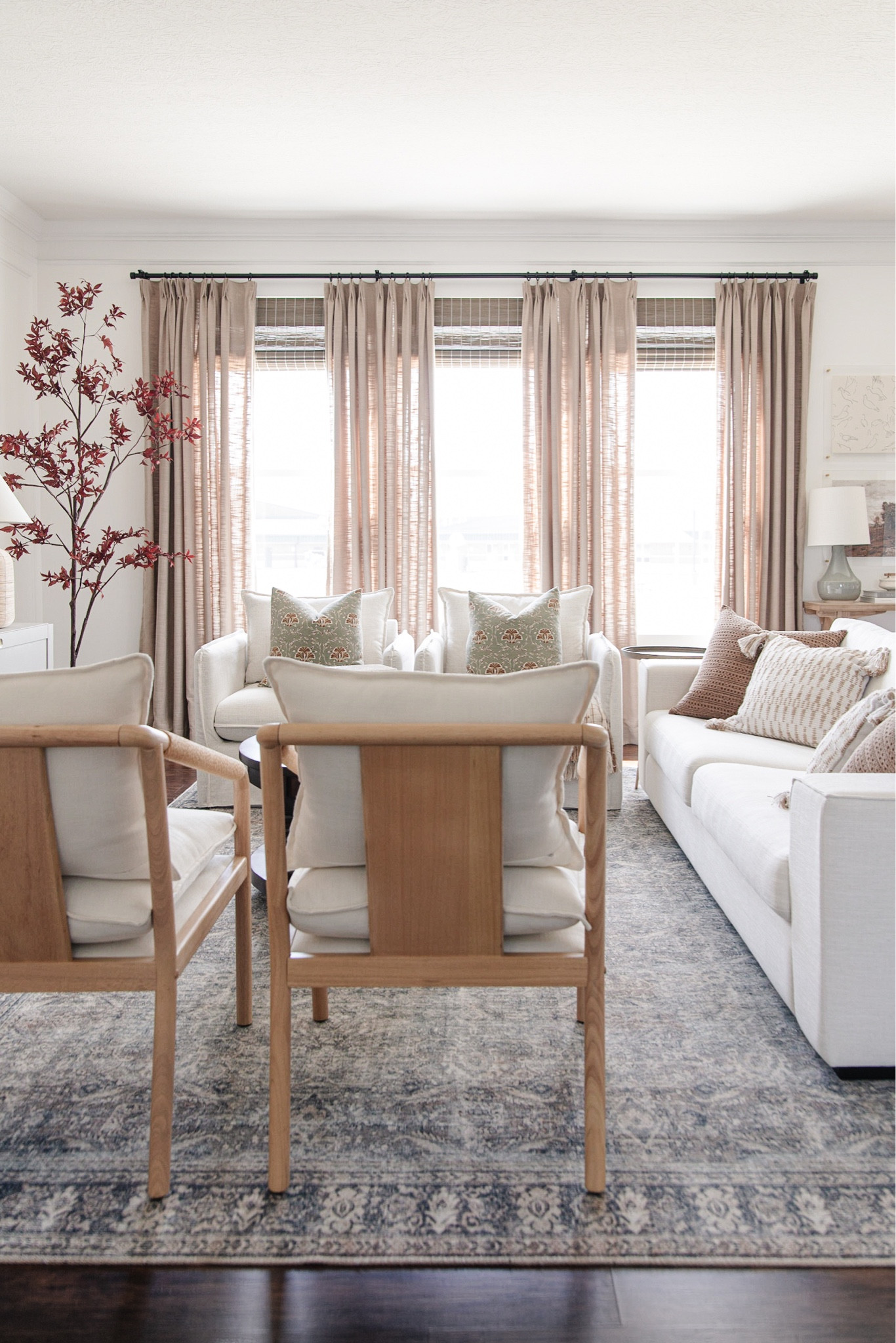 Cozy fall living room decor, ventura wood frame accent chair, linen berea chair, fall throw pillows, grey beige twopages curtains, faux fall tree with autumn leaves

#LTKsalealert #LTKhome #LTKSeasonal