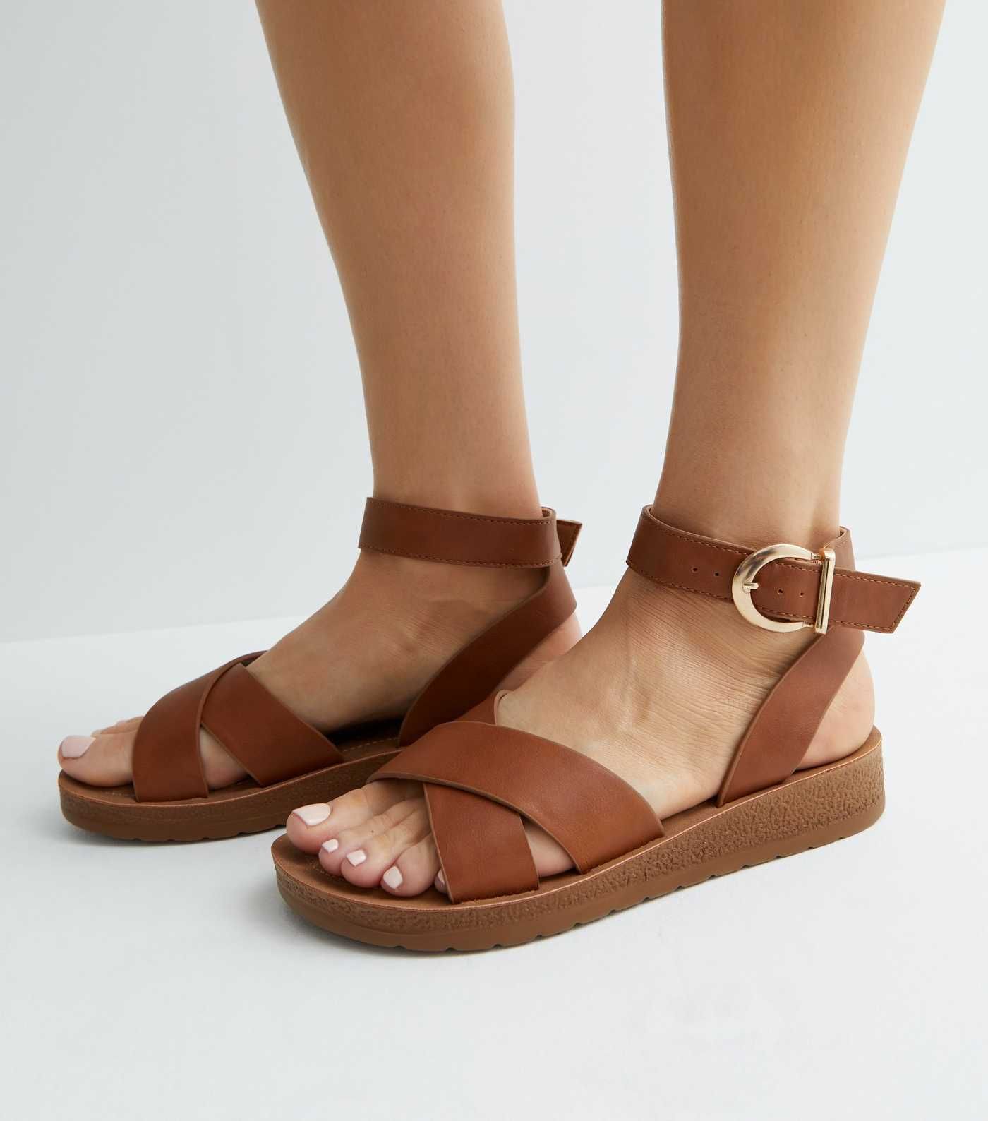 Wide Fit Tan Leather-Look Cross Strap Footbed Sandals
						
						Add to Saved Items
						Remov... | New Look (UK)