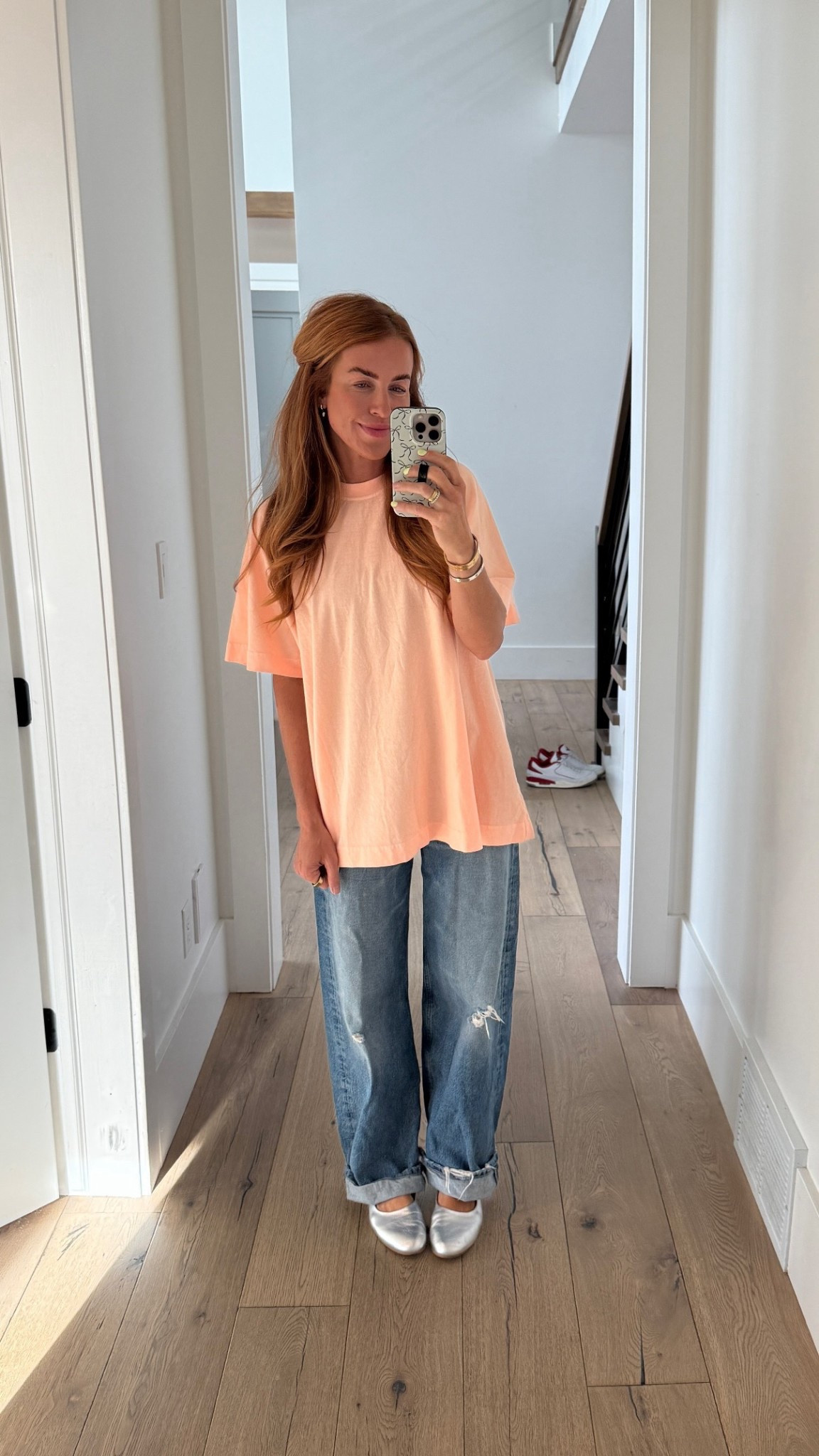 Shirt is from Free People. Super oversized and comfy. I’m wearing the XS and am typically a small!

I’m a big fan of Citizen of Humanity jeans and these ones are no different. I had my eye on them for 6 months. Wore them multiple times while we were on spring break. I sized down, I’m typically a 24/25 and got the 23.

Shoes are new and you guys know how much I love a metallic shoe! I got my true size 8 in them.