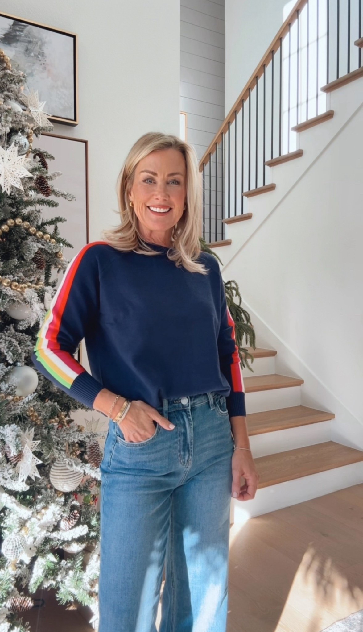 A Mr. SP fave! Adorable sweater that comes with a pop of striped piping along the sides. Wearing size Small ! 

#LTKSeasonal #LTKHoliday #LTKOver40