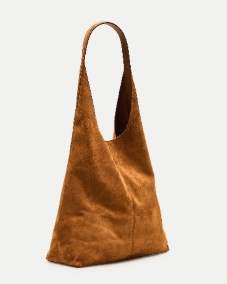 Slouchy tote in suede
JCrew 

Finally, a tote you can take everywhere (and we mean everywhere. . .). Meet the sack bag, our cool carryall that's work- and weekend-approved, thanks to the polished suede finish and effortlessly unstructured silhouette

#LTKootd #LTKTravel #LTKWorkwear