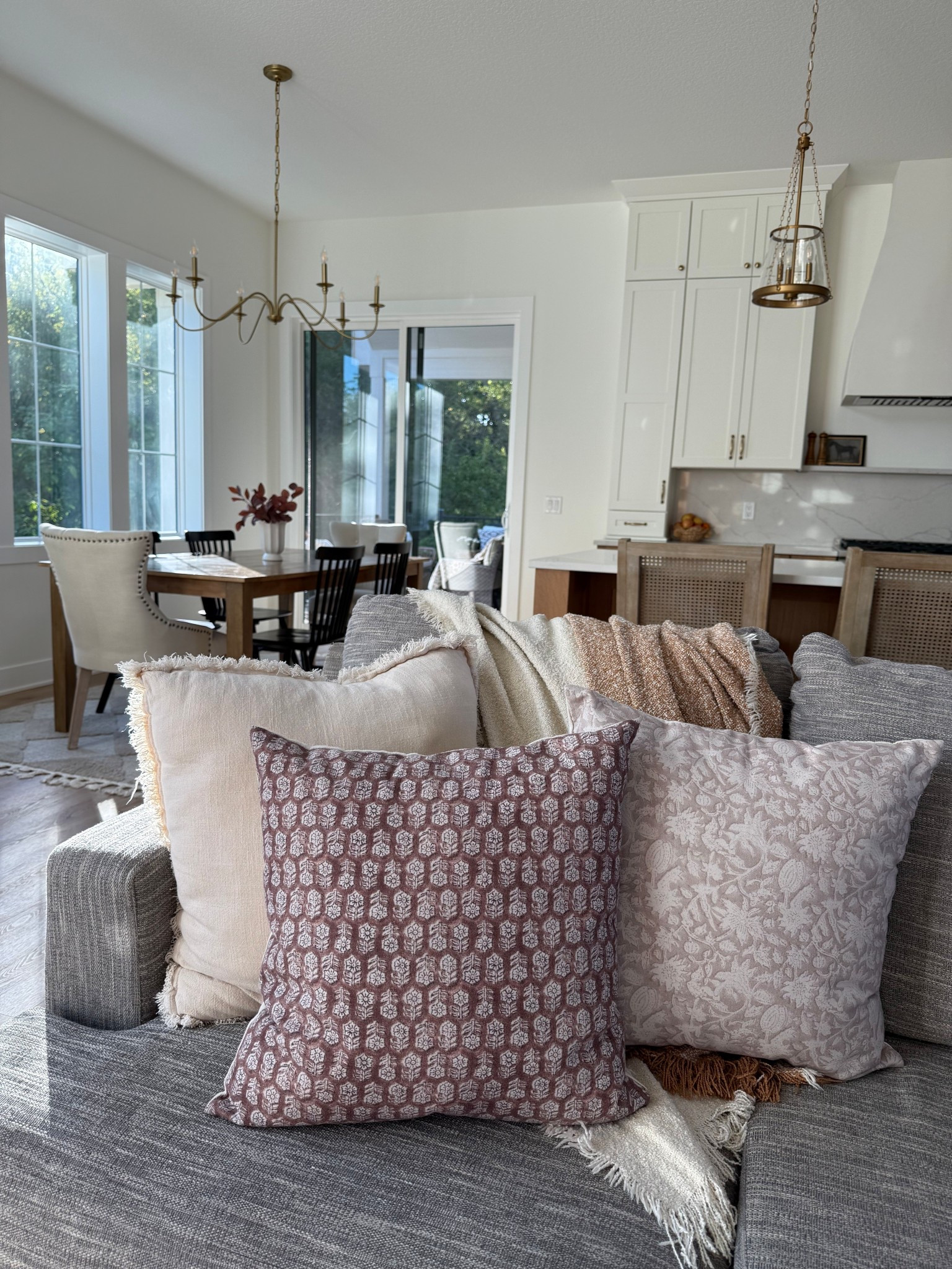 Fall throw pillow covers! 
Gold kitchen light fixtures. Dining table chandelier and island pennant fixtures. 

#LTKHome #LTKSeasonal