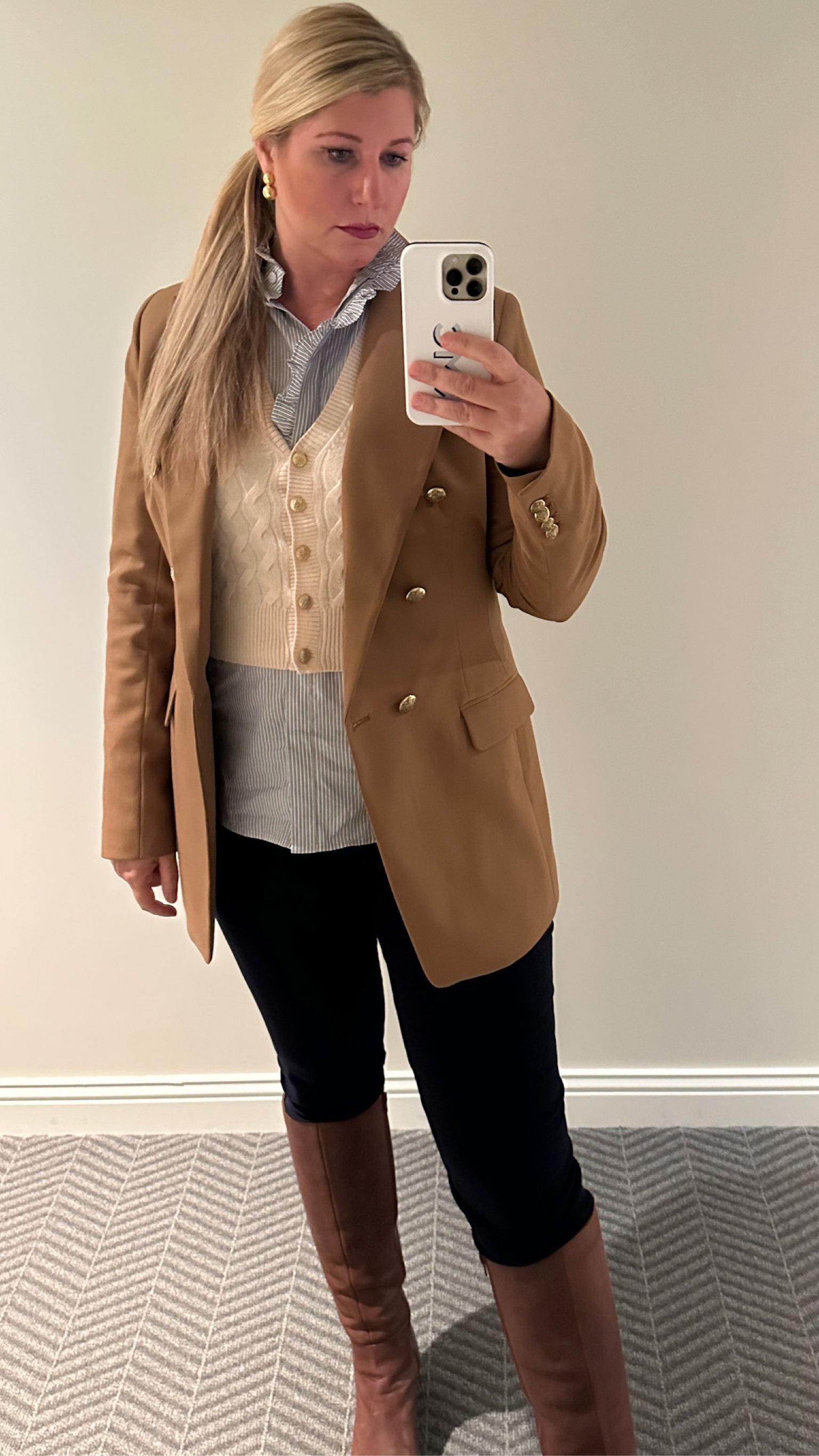 Been mixing in these pieces with different blazers and top pairings all fall long. Camel blazer, cashmere vest, blue ruffle shirt, navy riding pants, brown leather knee high boots, gold double ball earrings

#LTKSeasonal #LTKstyletip #LTKover40