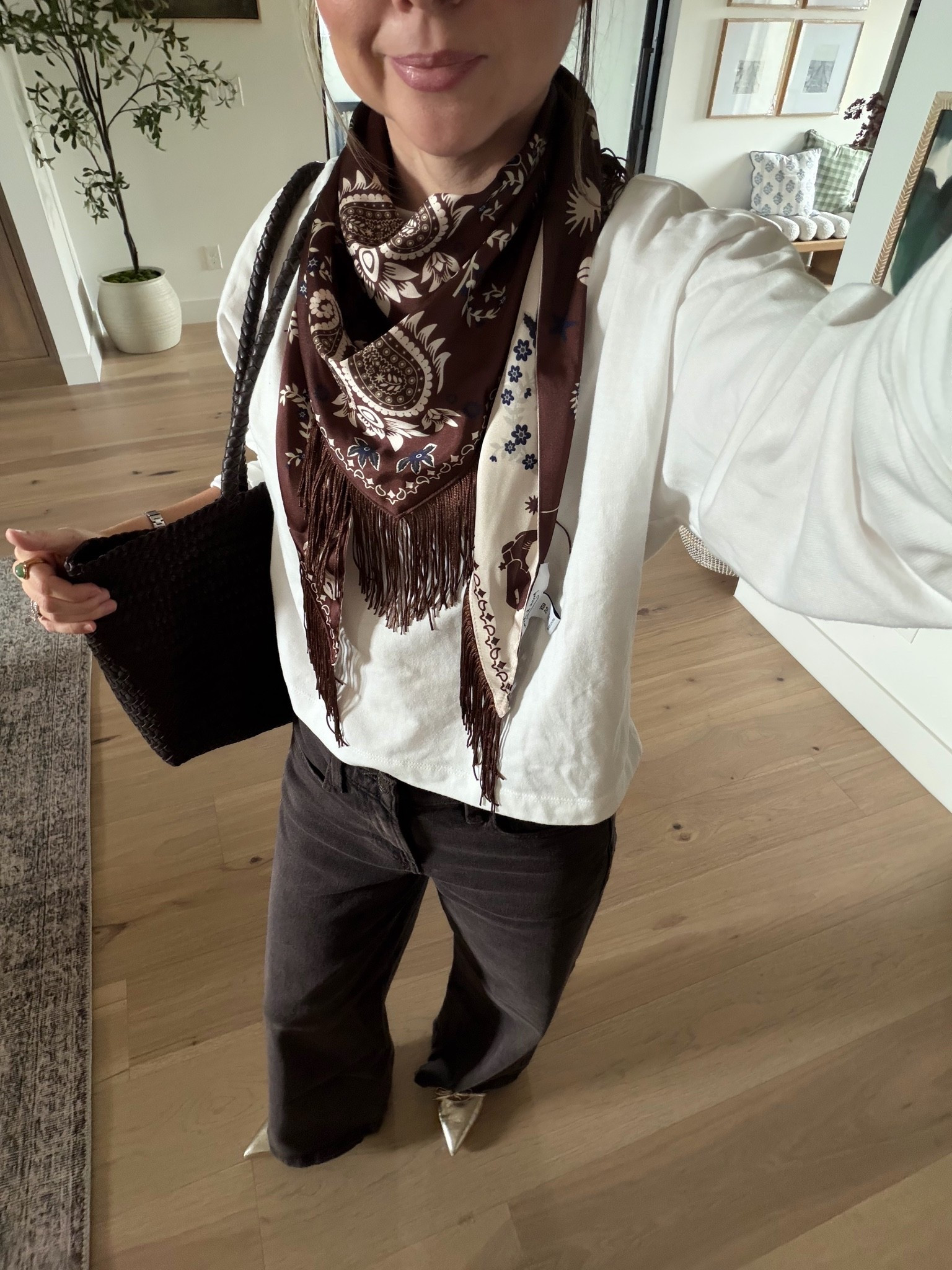 A reversible scarf is perfect for fall so many ways to wear it!! This one has the cutest western prints in brown and off white love it with a basic top under it

#LTKootd #LTKgrwm #LTKPetite