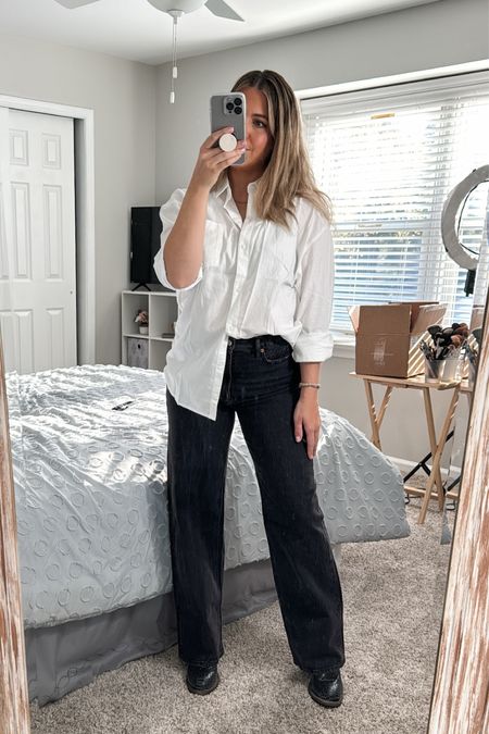 Love a good Old Navy find! These black washed wide leg jeans are great at dabbling in the trend without breaking the bank and i wanted a white button down that draped on the body in a more flattering way without spending $150+… this white Oxford blend boyfriend button down is perfect!

sizing details:

jeans in a 6 regular
top in a Small
i’m currently around 140-145lb and 5’3"

#LTKmidsize #LTKfindsunder50 #LTKHoliday