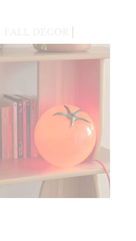 OMG! How cute is this tomato lamp? Pop this table lamp onto a desk, bookshelf or any place your home needs a pop of red! 

#LTKunder100 #LTKhome #LTKFind