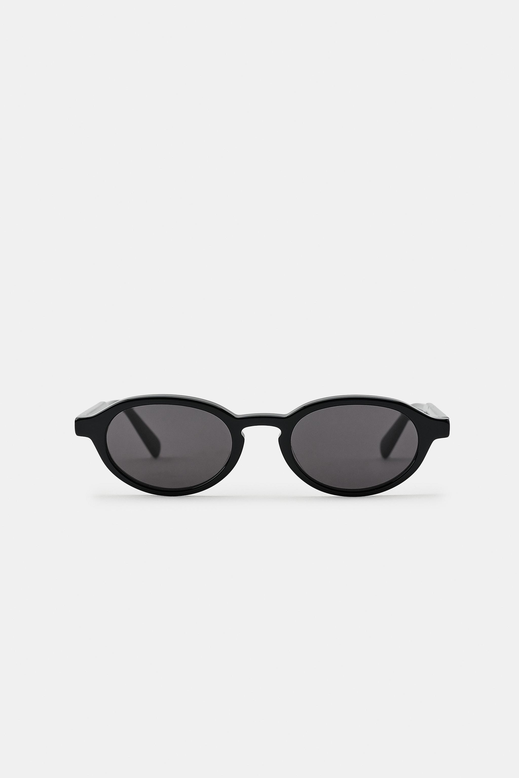 Oval sunglasses with an acetate frame. Polarised lenses. Case included.UV/UVA 400 protection. Cat... | Zara UK