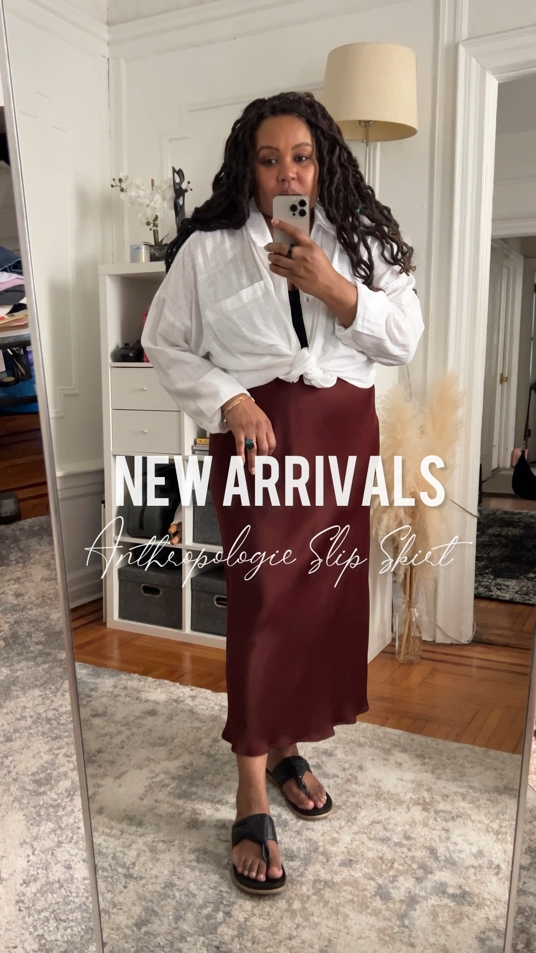 Fall outfit. New Arrivals from Anthropologie. Slip skirt paired with oversized white shirt and black leather sandals. 

Wearing 2X skirt, runs small; button down shirt runs large. #ltkstyletip #ltkunder100 #ltkcurves #DSW 

#LTKover40 #LTKSeasonal #LTKmidsize