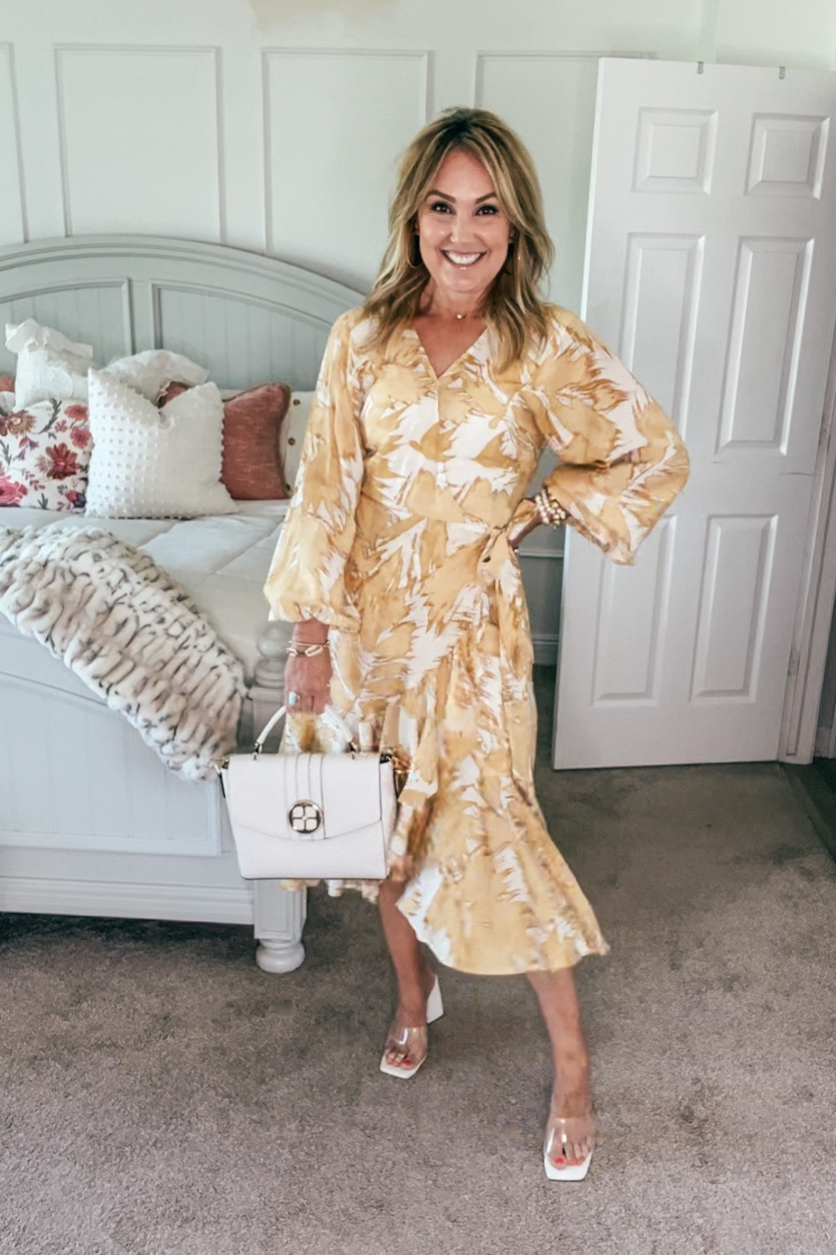 Floral Maci Wrap Dress wearing size medium. 
White/clear heels
White satchel
ON SALE!!

#LTKFind #LTKsalealert #LTKunder50