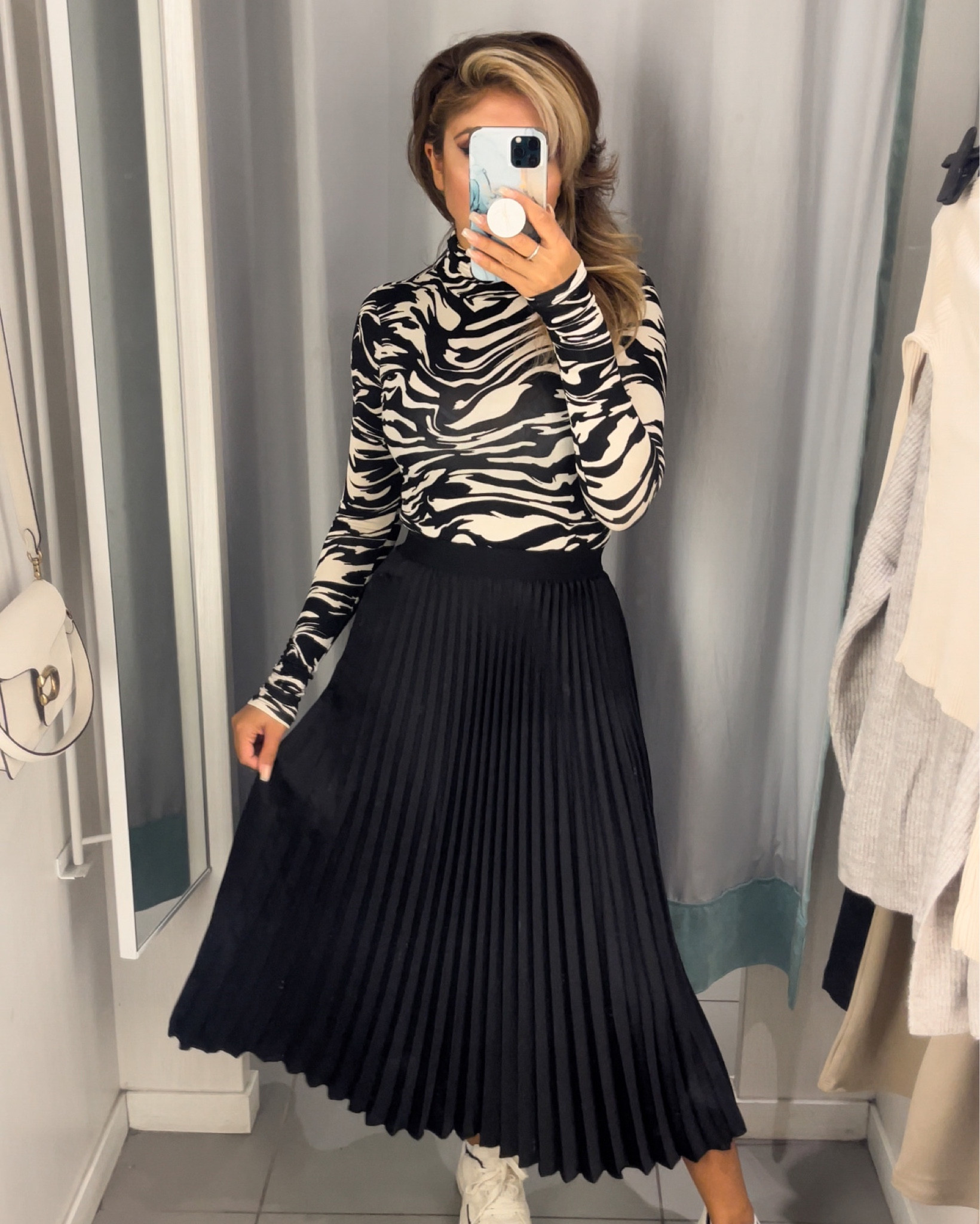 Flowy skirt paired with this beautiful turtleneck. Shirt in size small. Turtle neck in size small also

#LTKstyletip #LTKworkwear #LTKsalealert