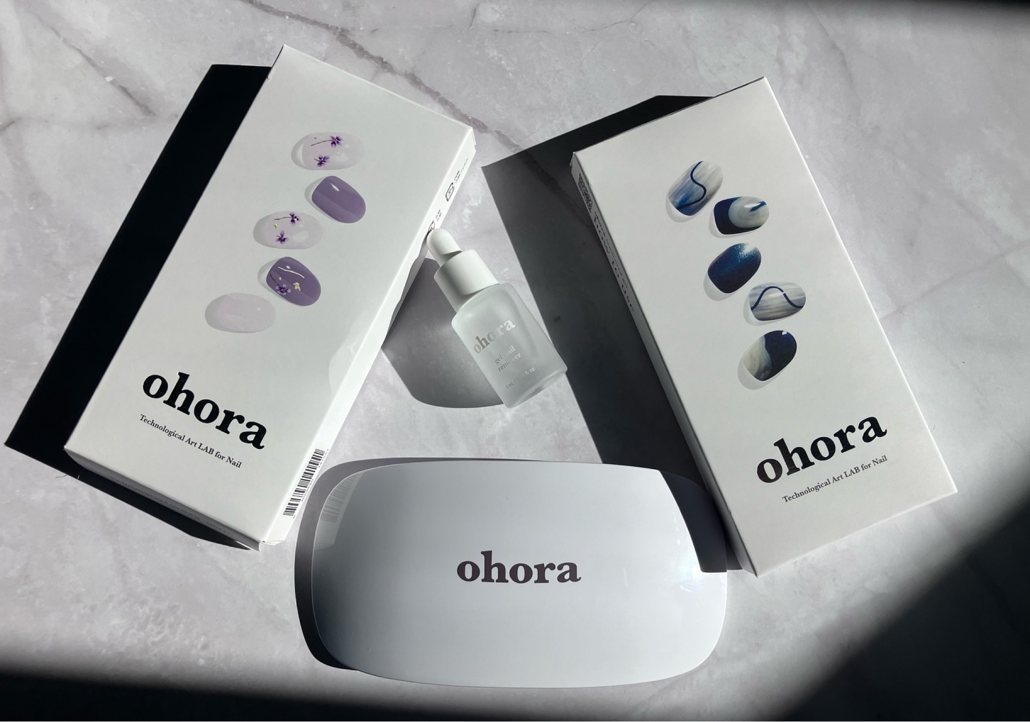 💅✨ These @ohora_usa semi-cured gel nail strips give you a flawless, long-lasting mani in minutes! #gifted 

Who else loves an easy, mess-free nail upgrade? Get them now at Ohora’s website, Amazon, target, and Walmart! 

Designs pictured: dancing flower & navy touch 

#ohora #ohoranail #nails #nailsathome #gelnails #ugc #beautyugc #amazon #walmart #target