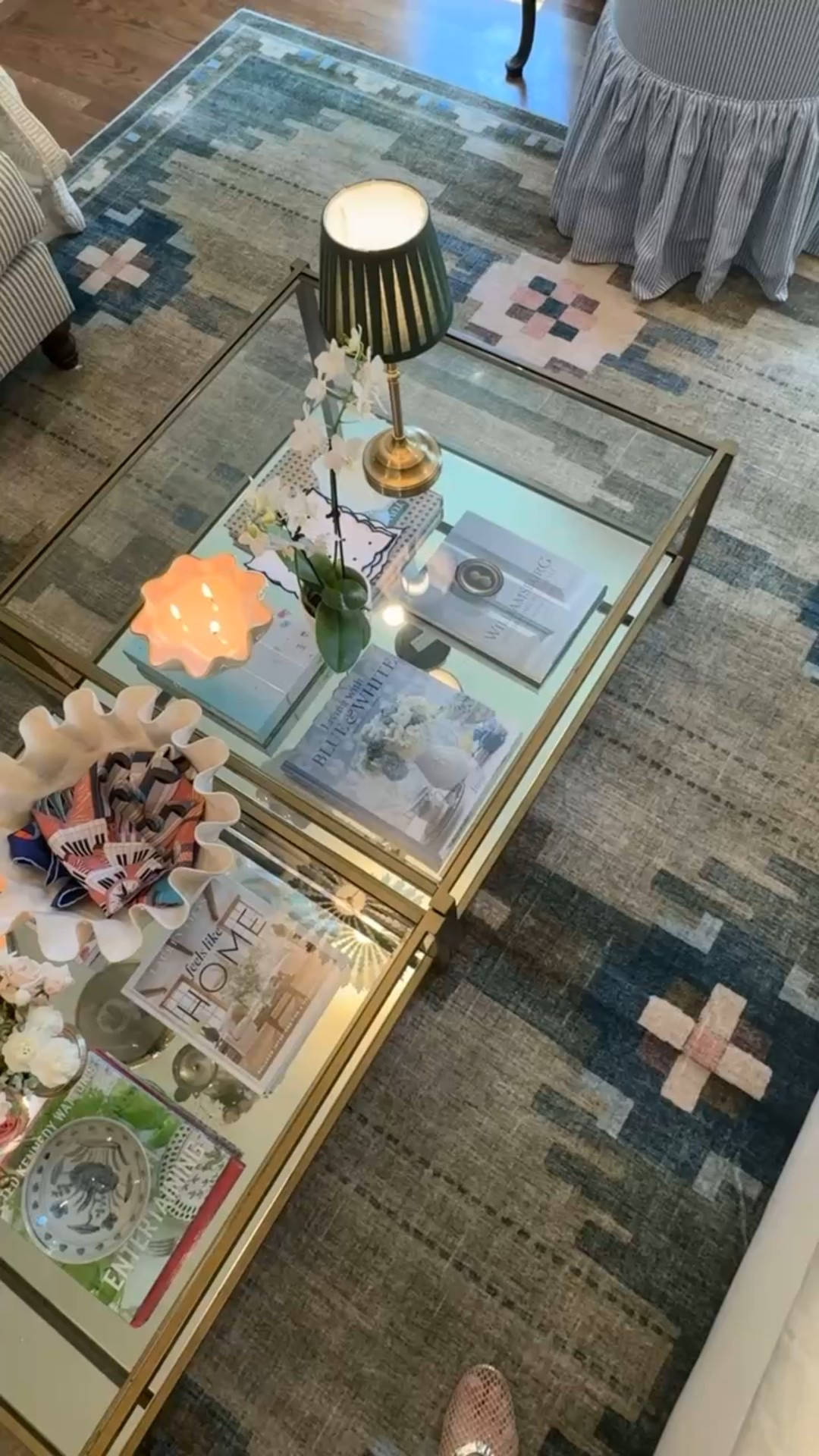 These coffee tables and this rug are some of my favorite pieces in our living room. They add so much character while still being classic. Classic home, green and blue rug, geometric rug, mirror coffee table, classic style, colonial home

#LTKHome