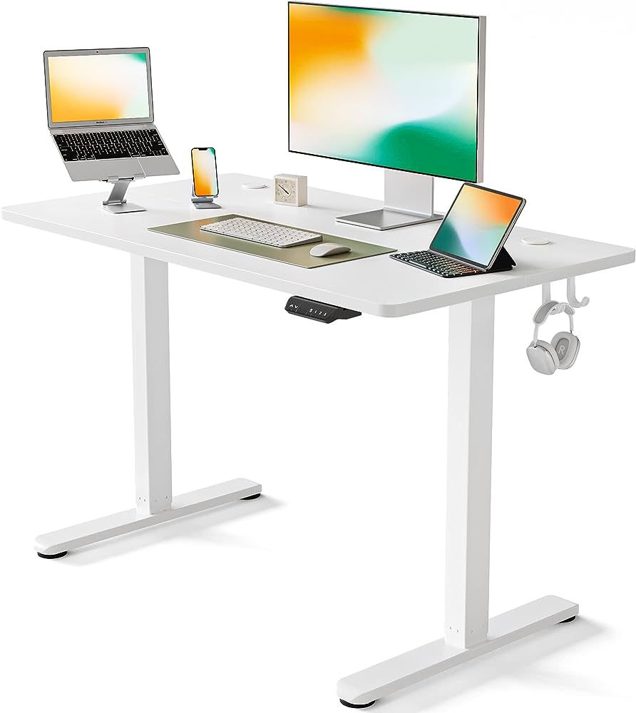 FEZIBO Height Adjustable Electric Standing Desk, 40 x 24 Inches Stand Up Table, Sit Stand Home Offic | Amazon (US)