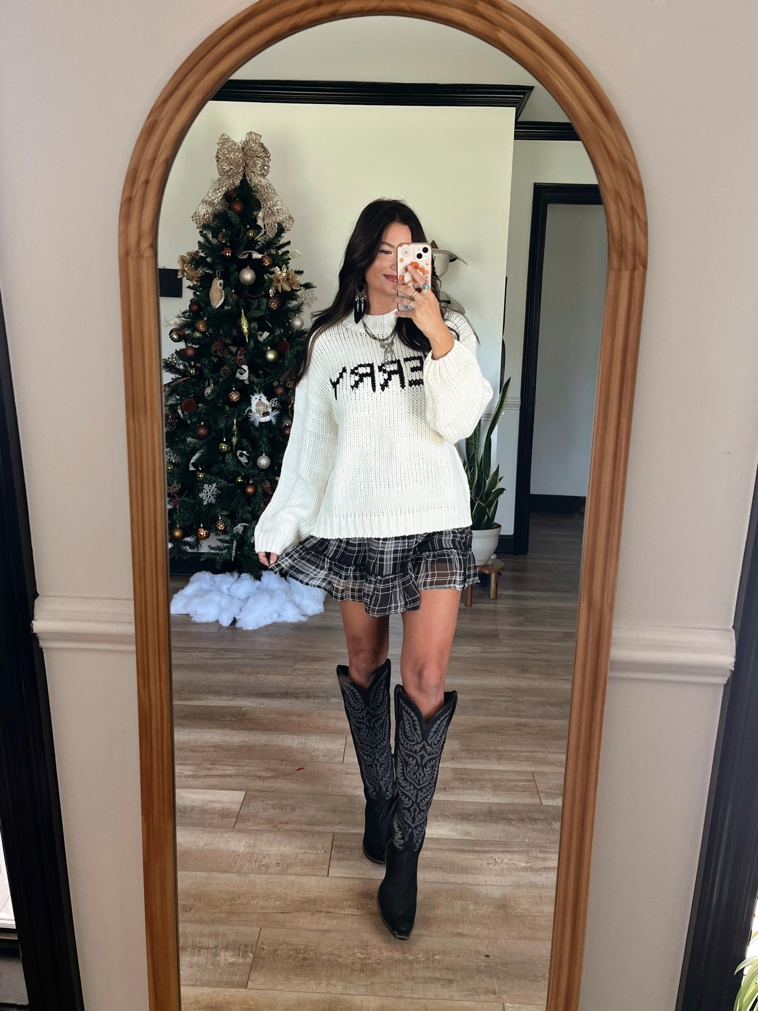 Merry sweater paired with plaid skort and my favorite western boots right now! All still on sale! Wearing small top & xs skort

#LTKSaleAlert #LTKHoliday #LTKootd