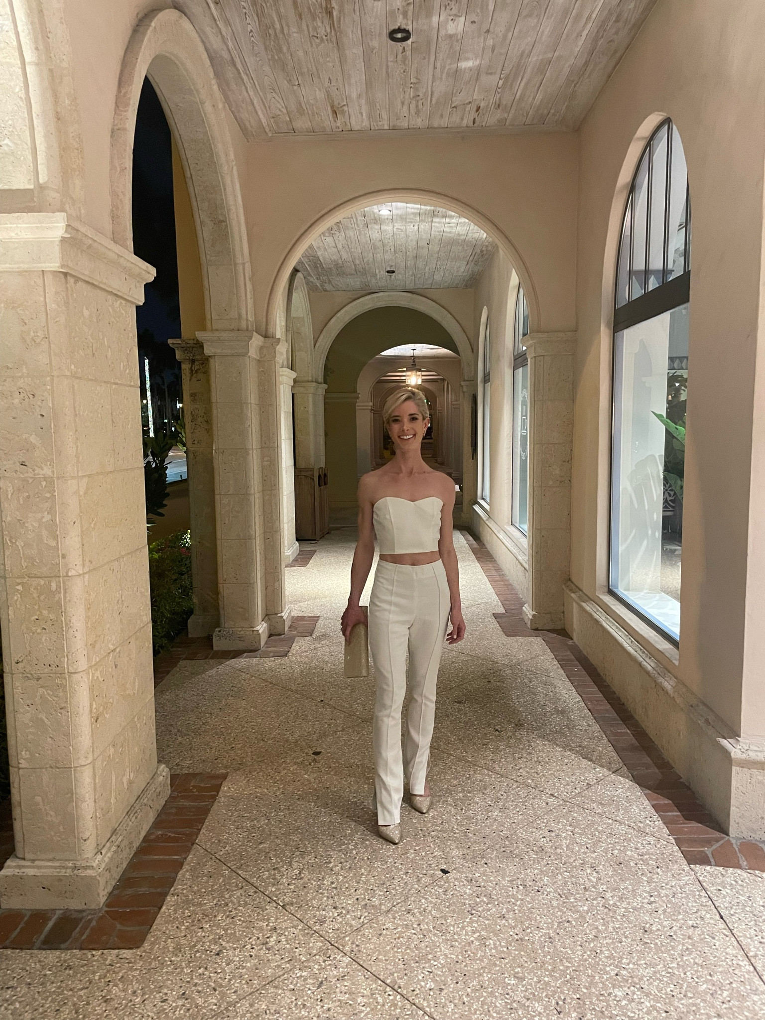 Styled Outfit from Saks and Amazon! Ivory crop top and matching high waisted Cinq a Sept pants. 

✨ Shoes:
DREAM PAIRS Women’s Point Toe Pump Shoe 
	•	Gold  Glitter	
	•	Heel height: 4" (approx) 		•	Size 6.5 

✨ Pants:
Cinq à Sept Pintuck seaming refines these chic high-waist, ankle-length crepe pants.
	•	Concealed side zip
	•	Front and back pintucks
	•	00 in Ivory

✨ Top:
SheIn Women's Sexy Bandeau Top 
	•	Strapless Sleeveless 
	•	Bandeau 
	•	Zip Back 
	•	Tube Top
	•	XS in White

#LTKFestival #LTKstyletip #LTKFind